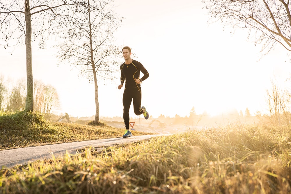 Image of a woman taking a photo.