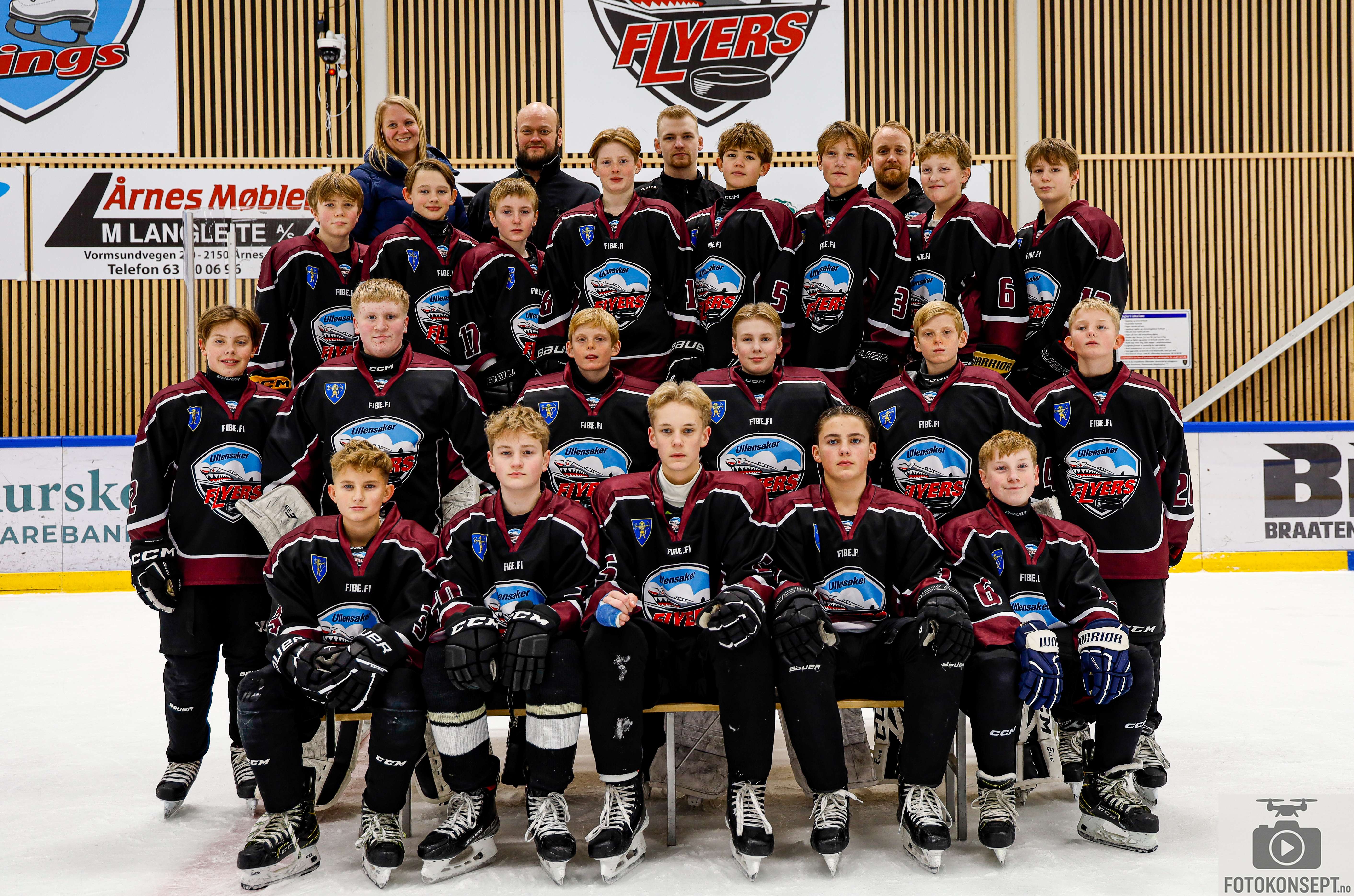 Image of a woman taking a photo.