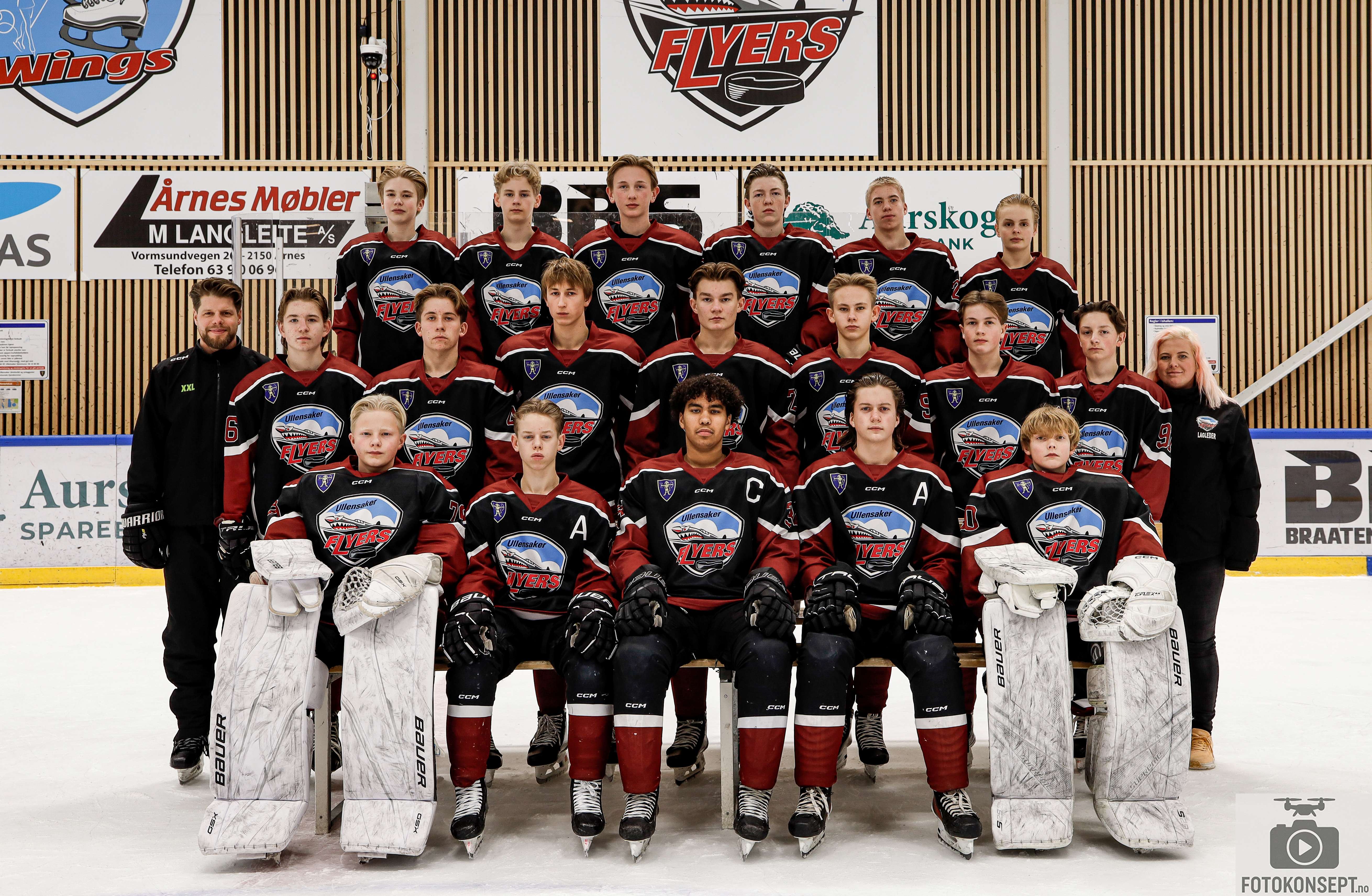 Image of a woman taking a photo.