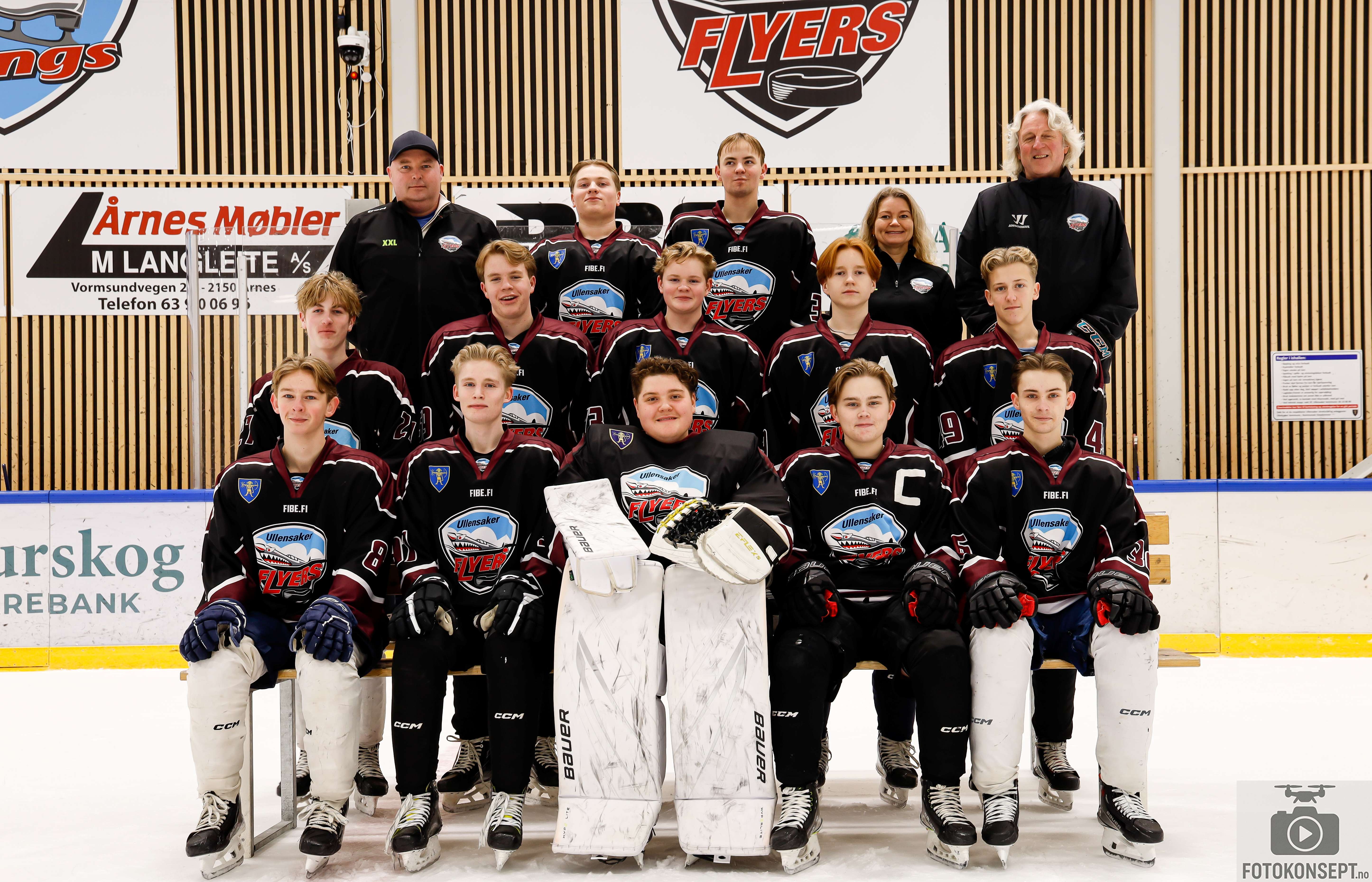 Image of a woman taking a photo.