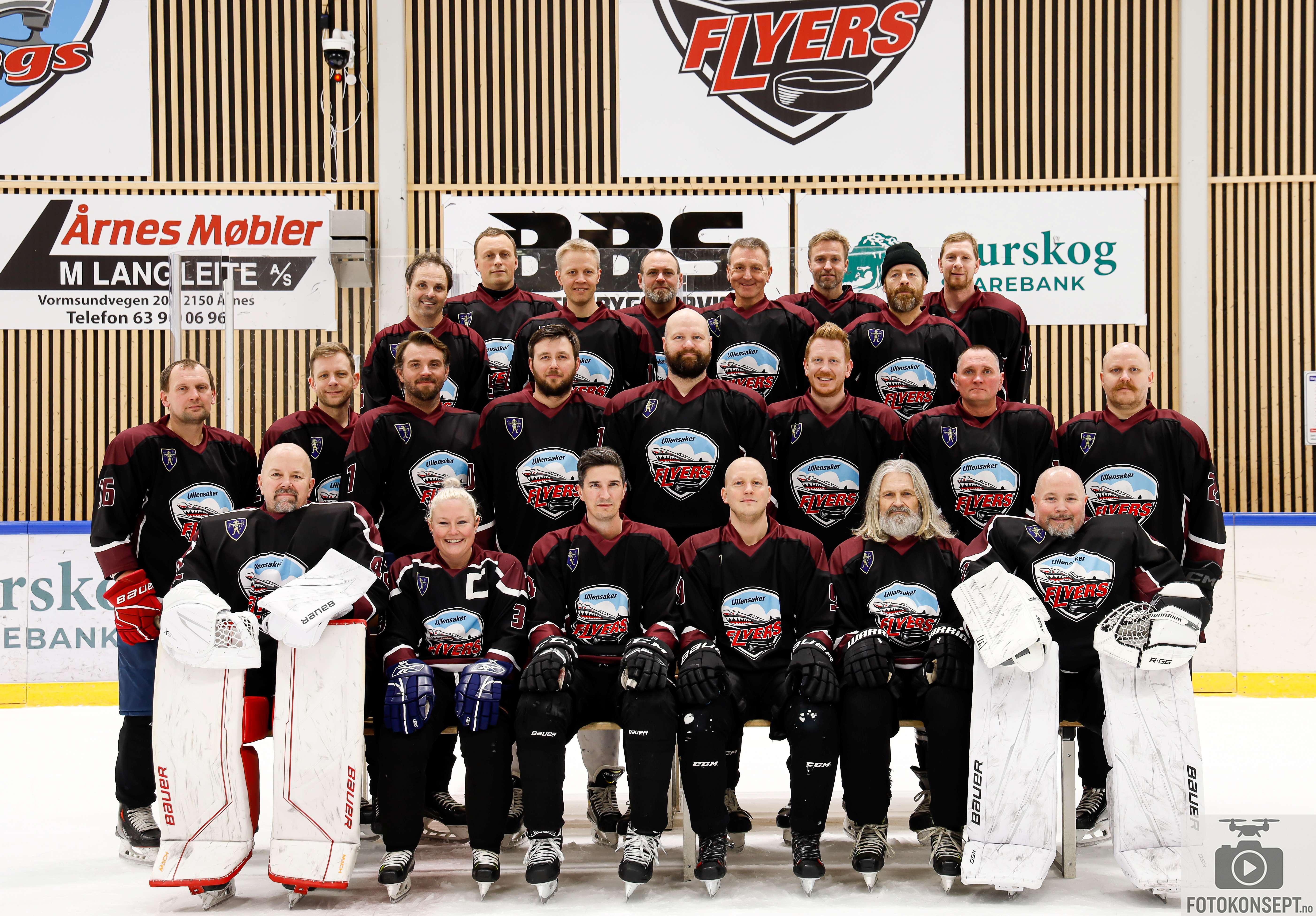 Image of a woman taking a photo.