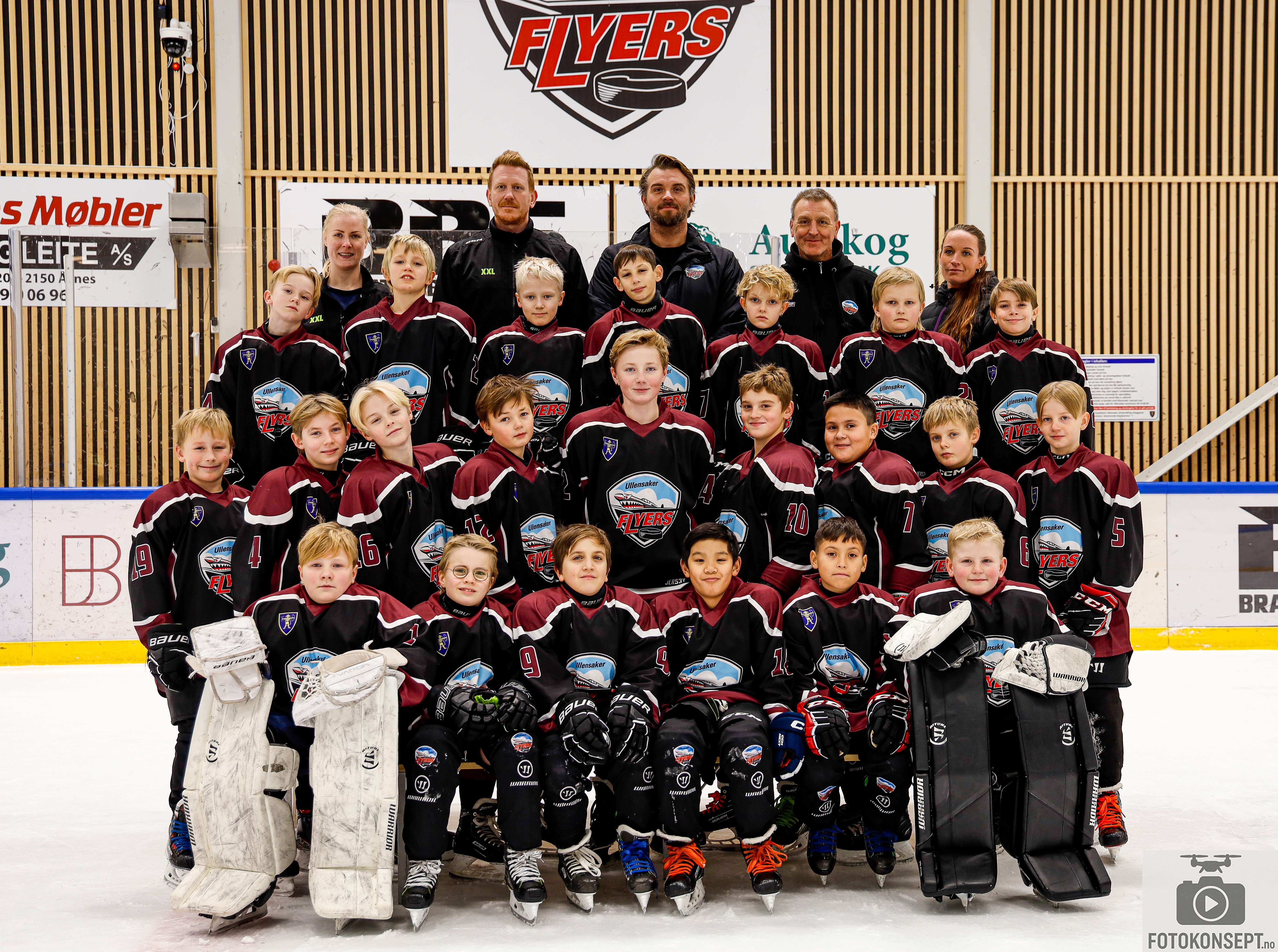 Image of a woman taking a photo.