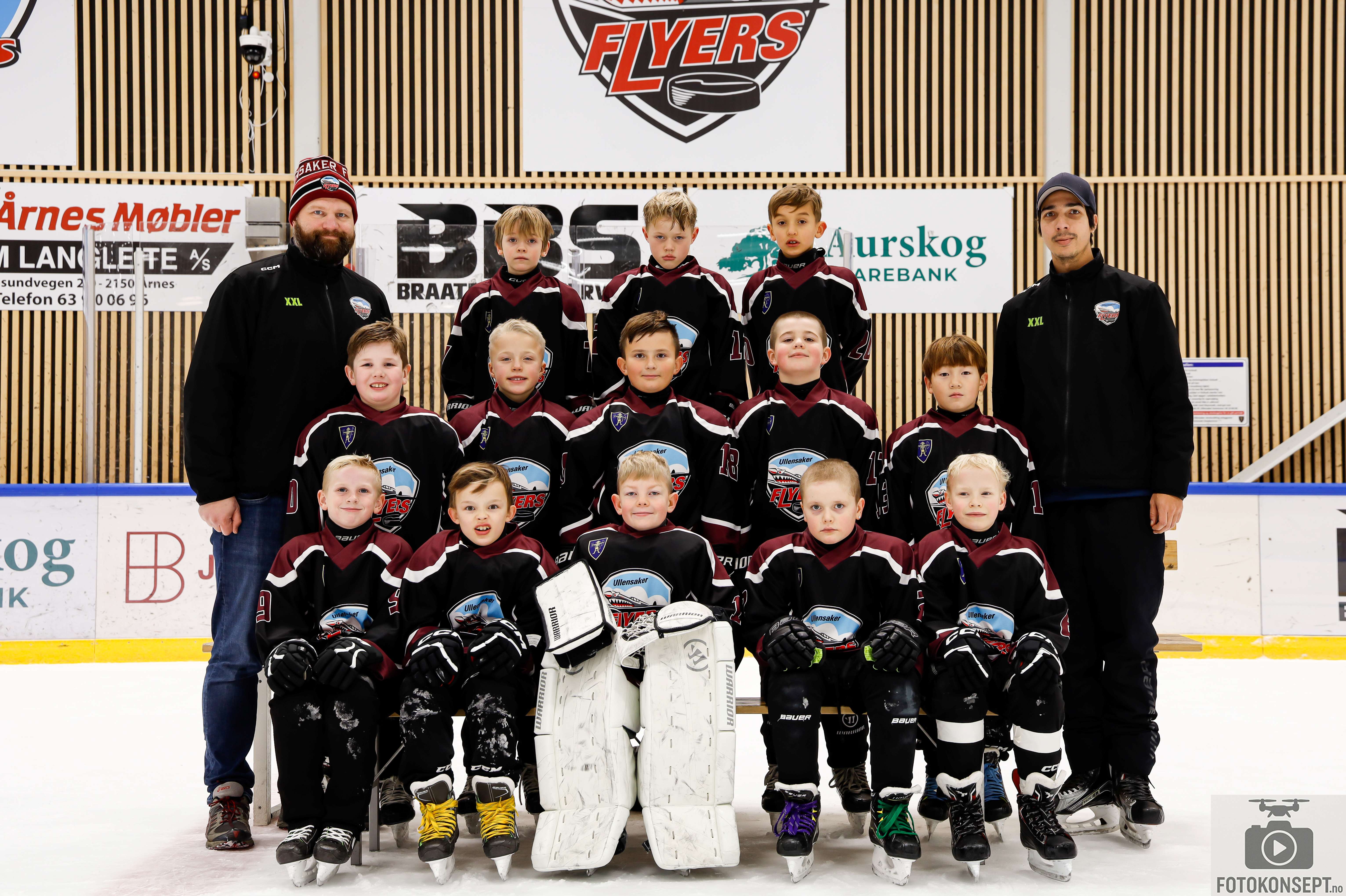 Image of a woman taking a photo.