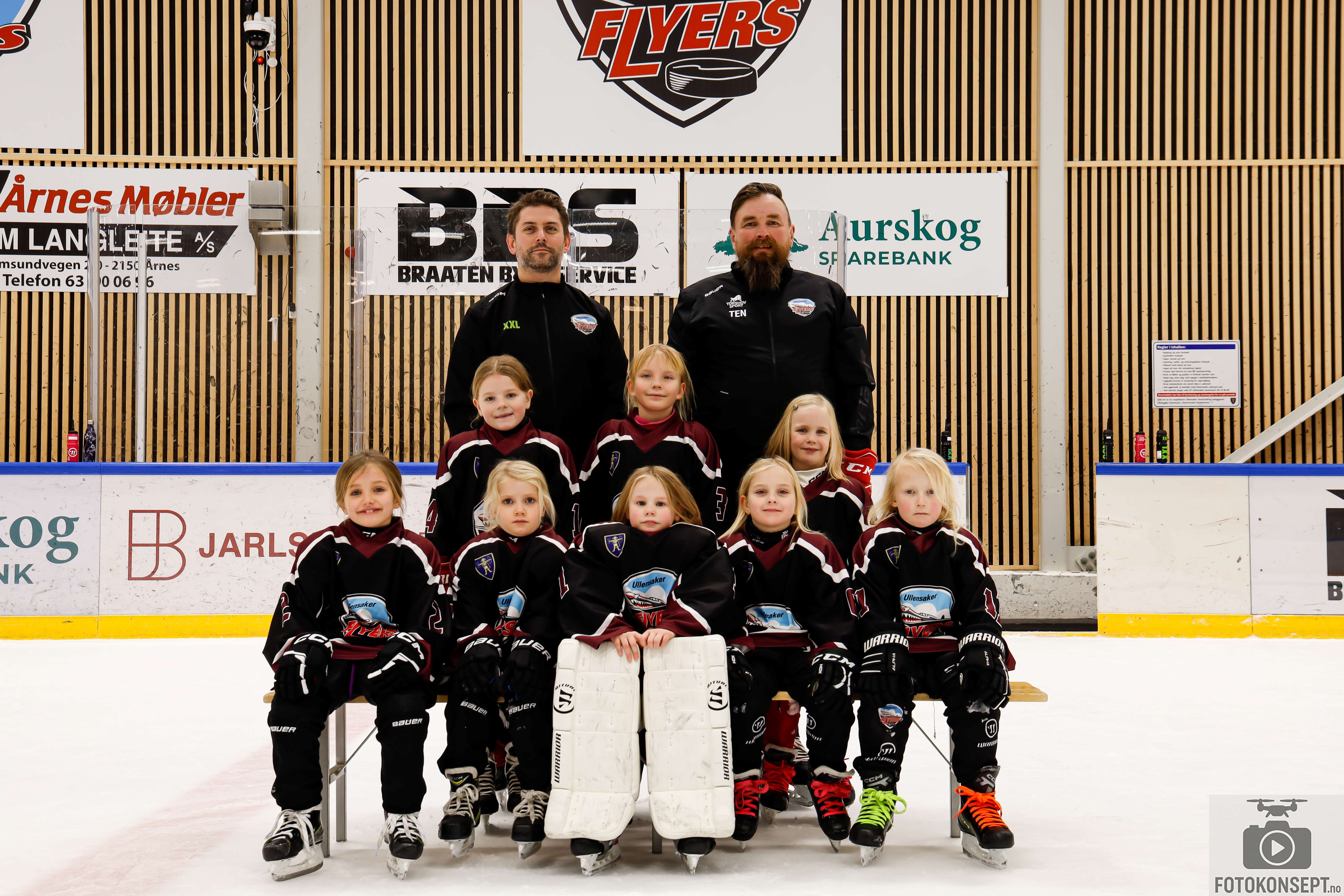 Image of a woman taking a photo.