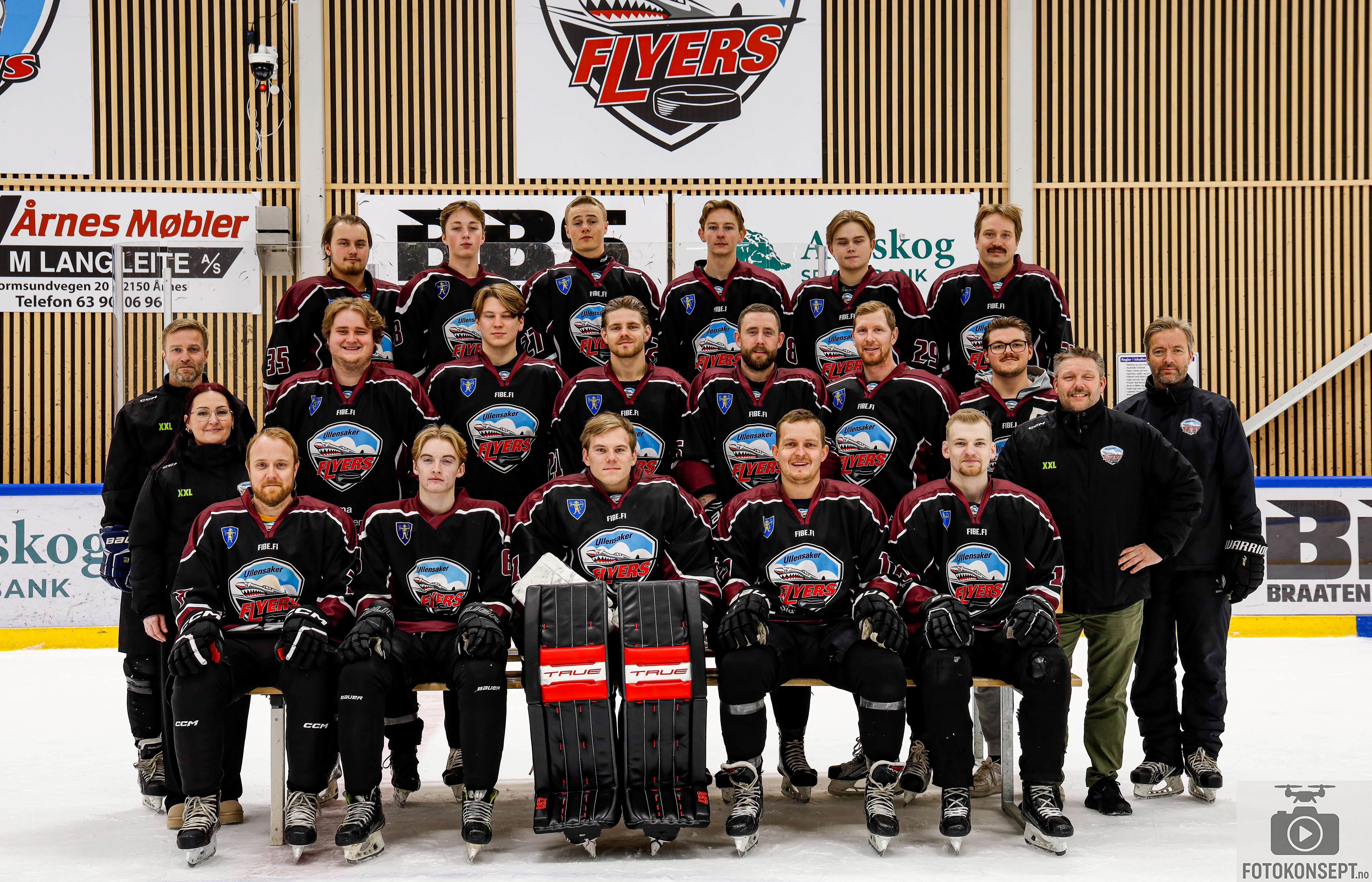 Image of a woman taking a photo.