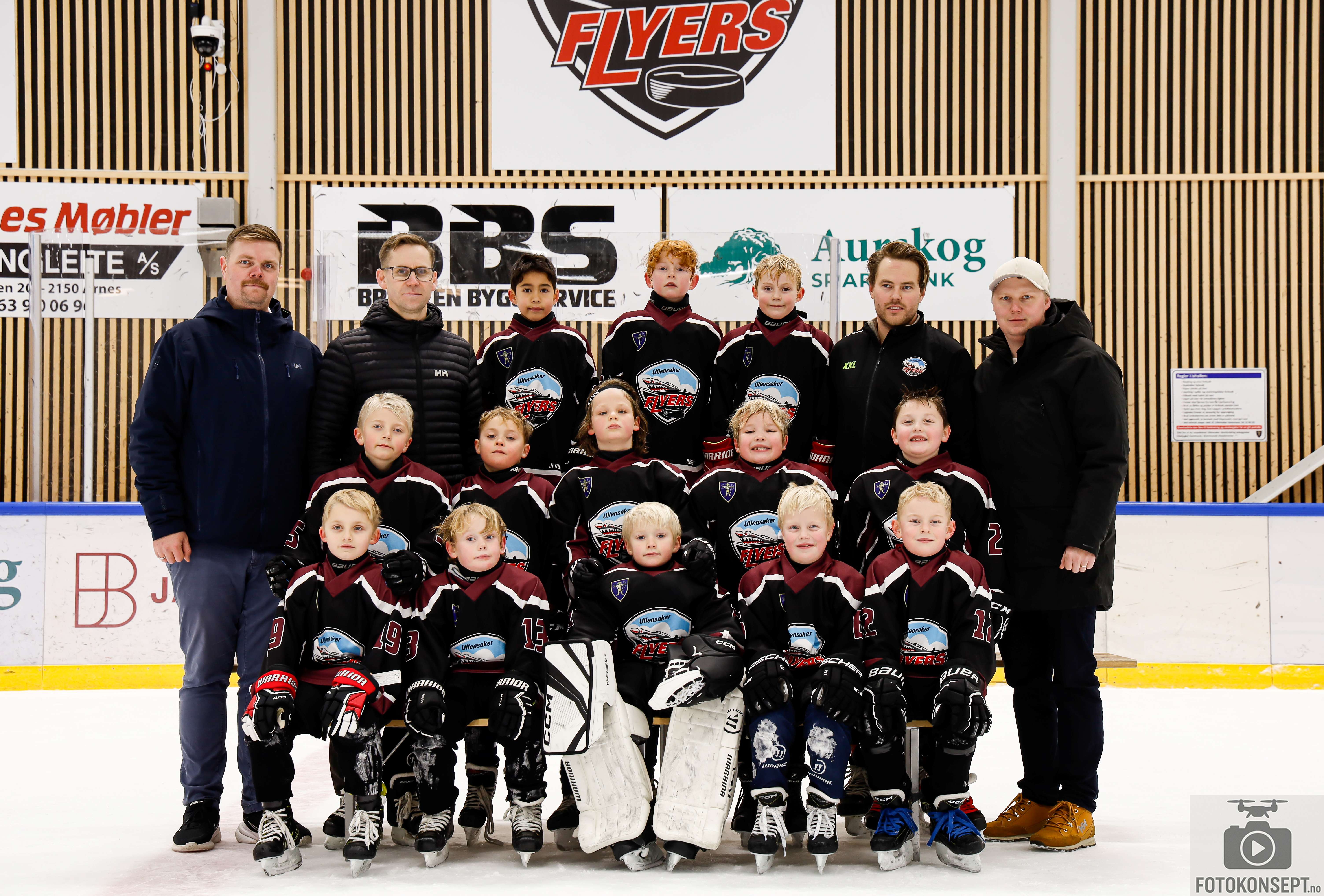 Image of a woman taking a photo.