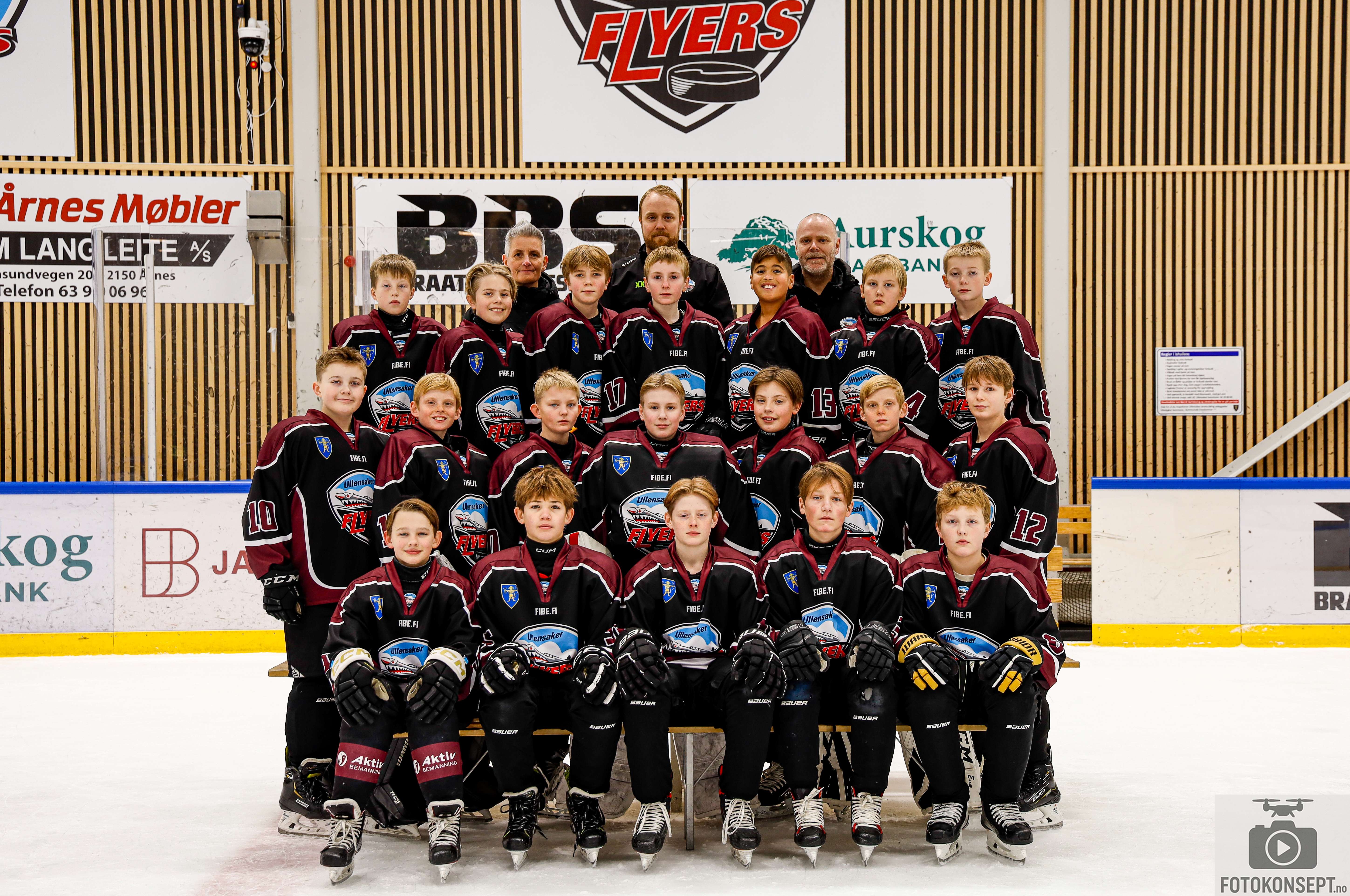 Image of a woman taking a photo.