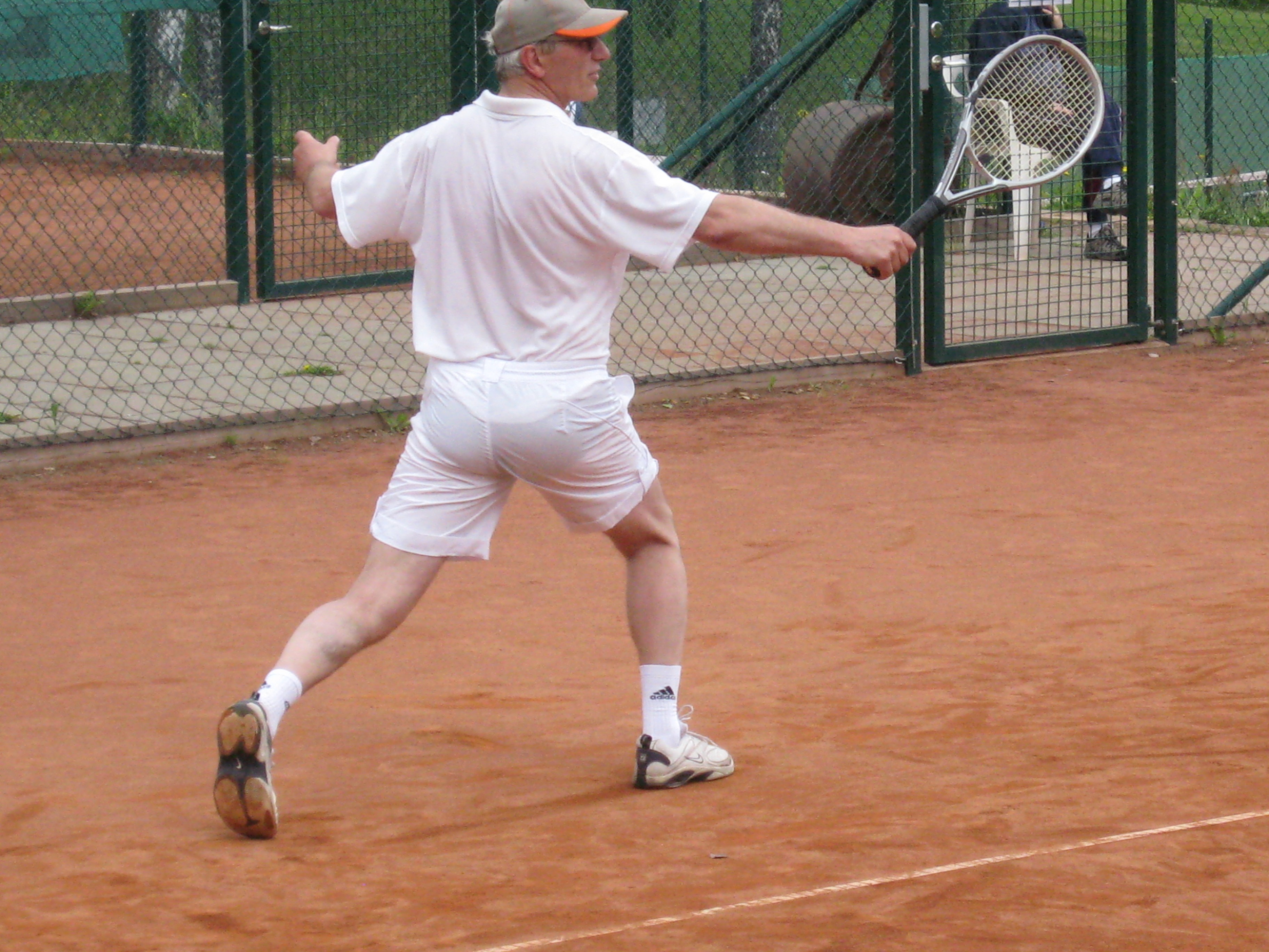 Image of a woman taking a photo.
