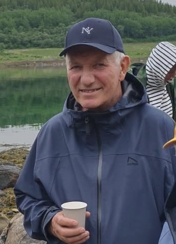 Image of a woman taking a photo.