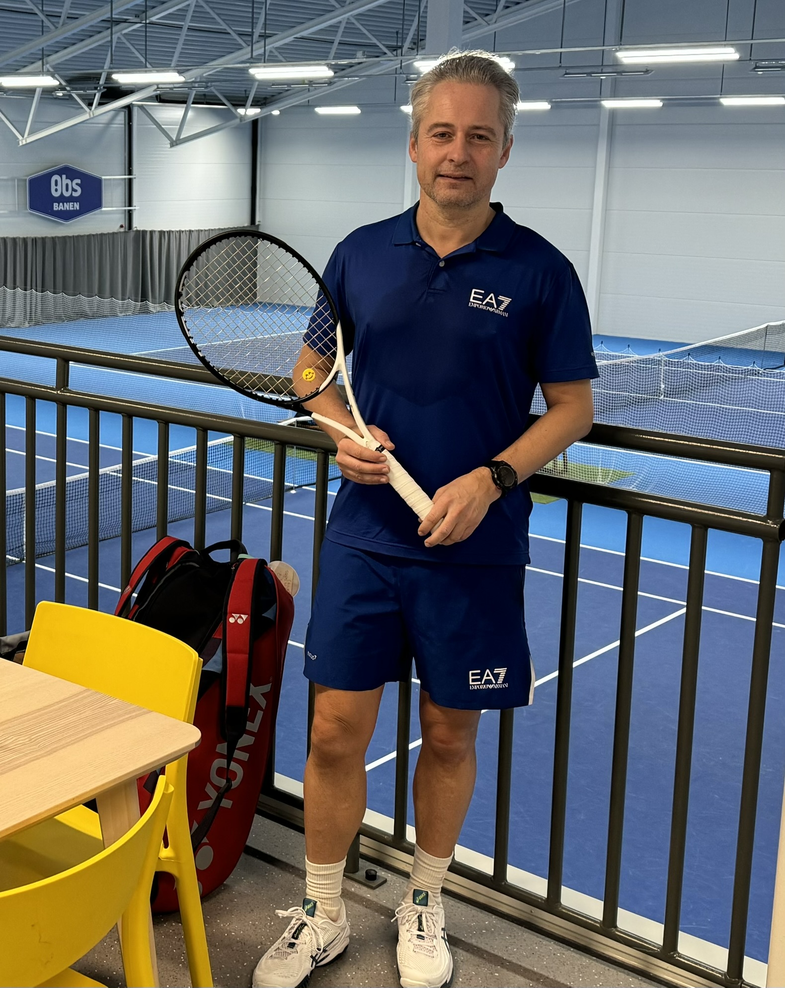 Image of a woman taking a photo.