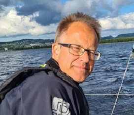 Image of a woman taking a photo.