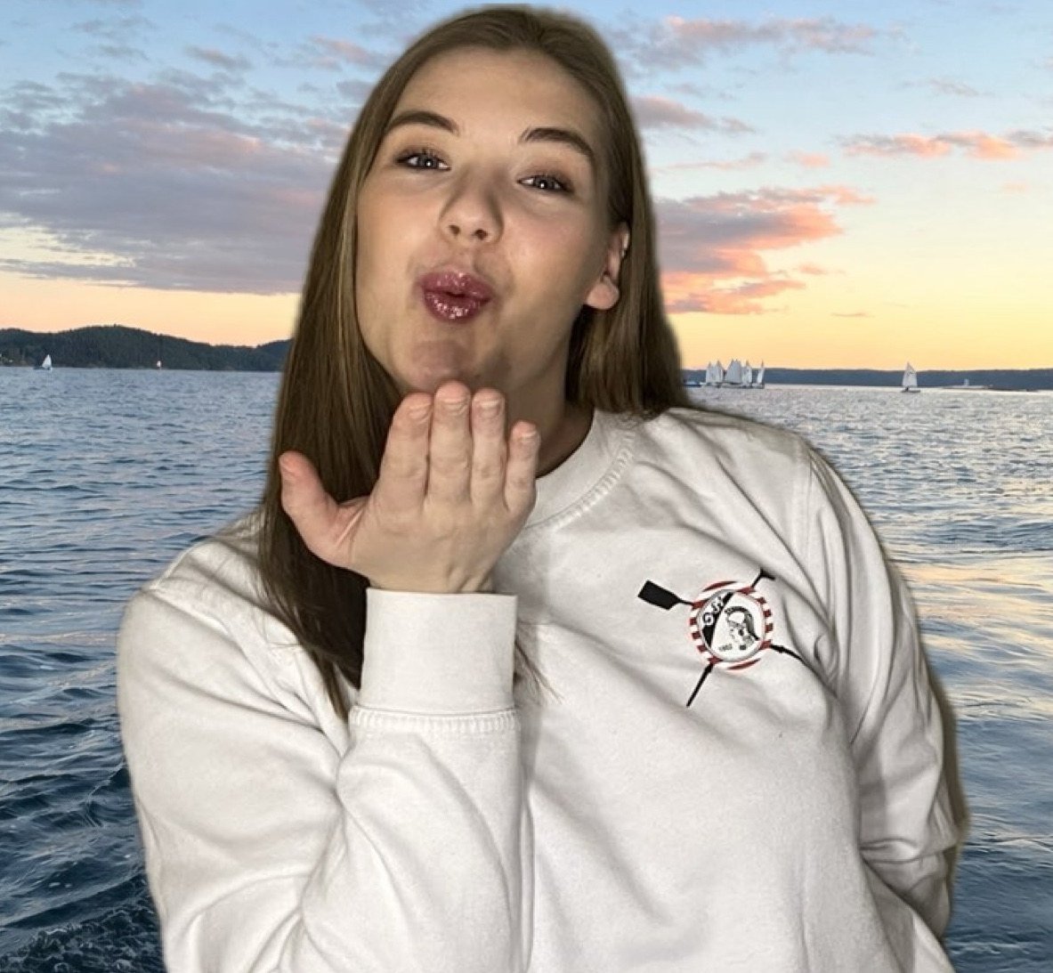 Image of a woman taking a photo.