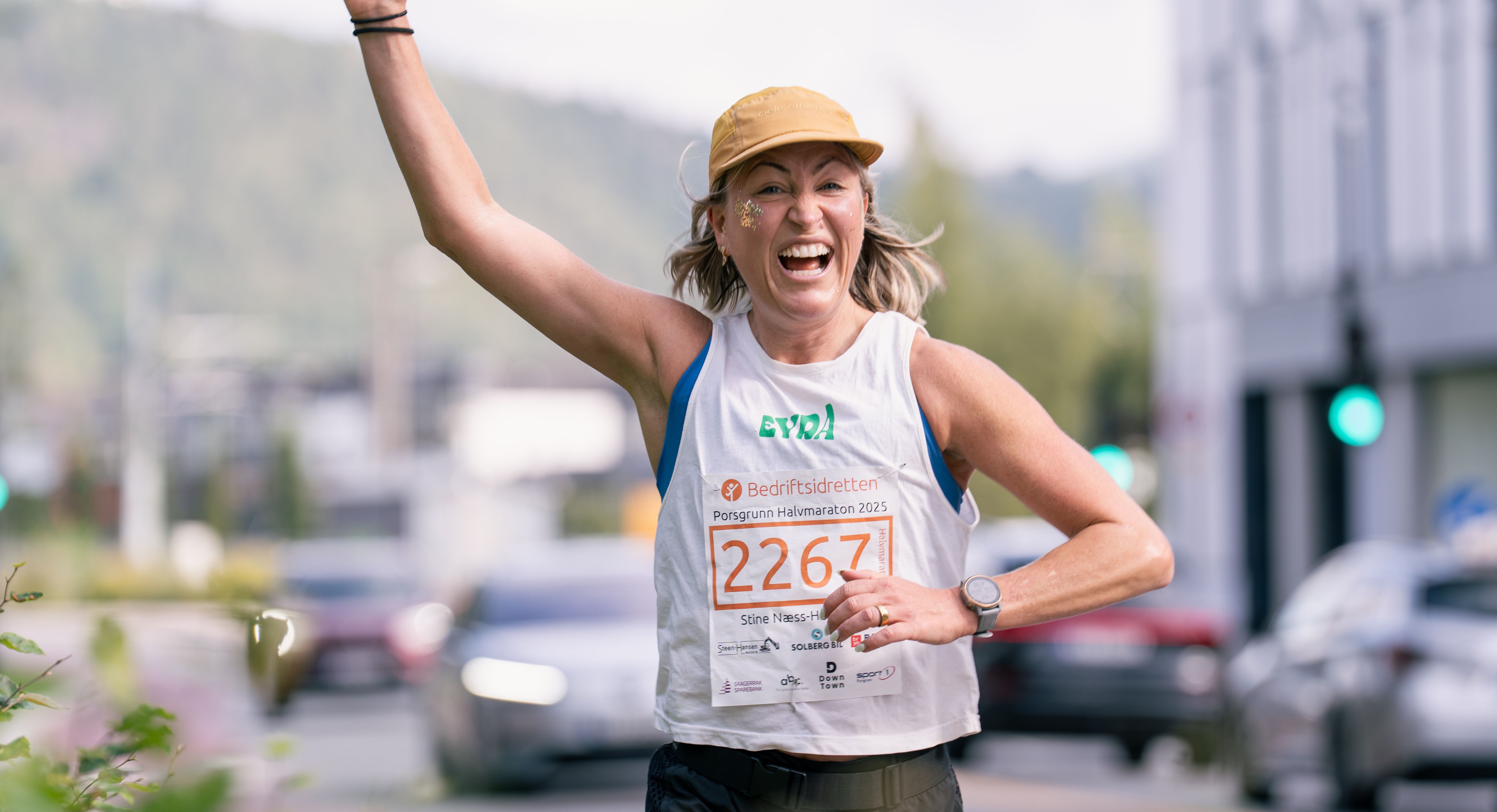 Image of a woman taking a photo.