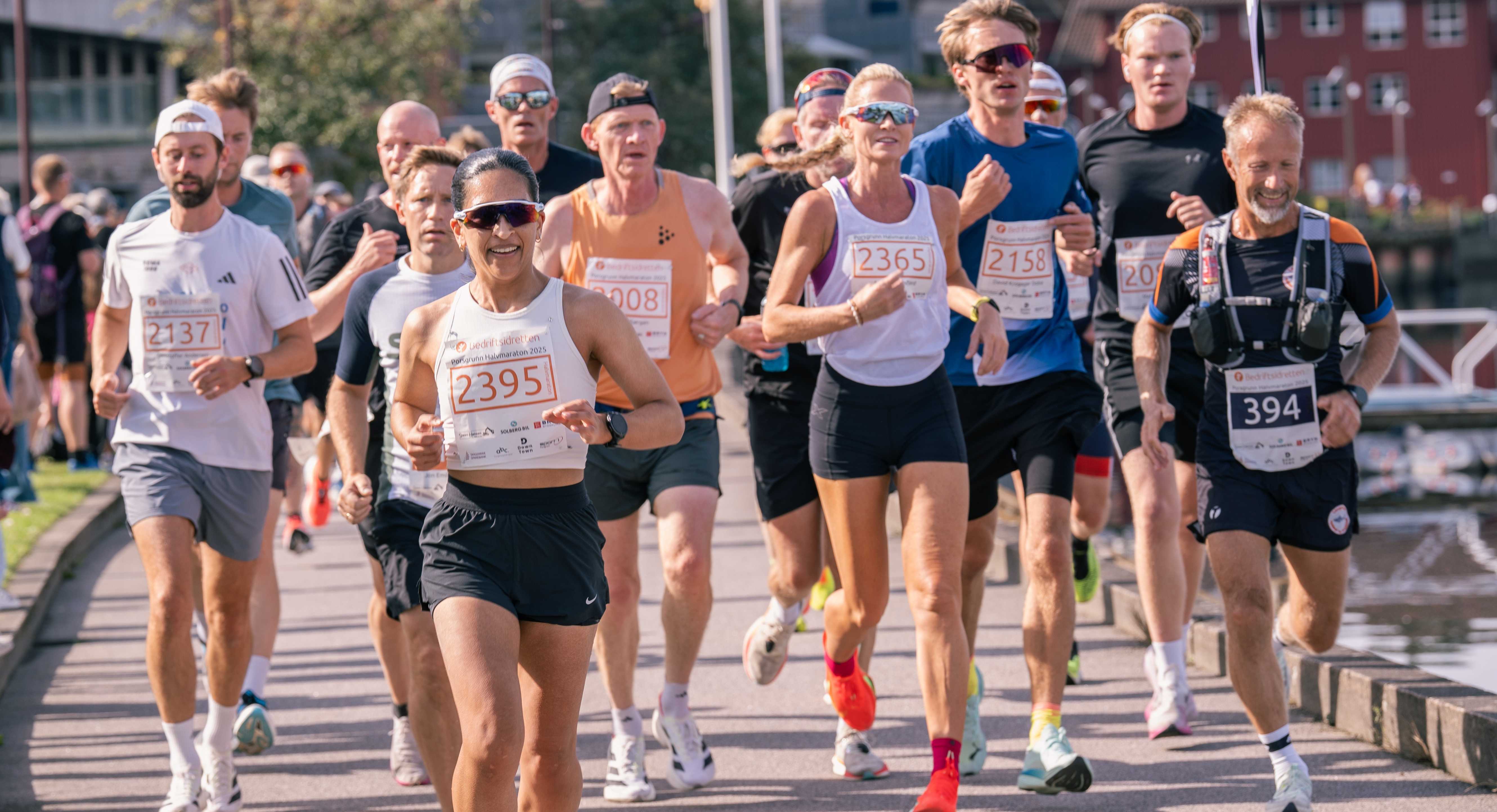 Image of a woman taking a photo.