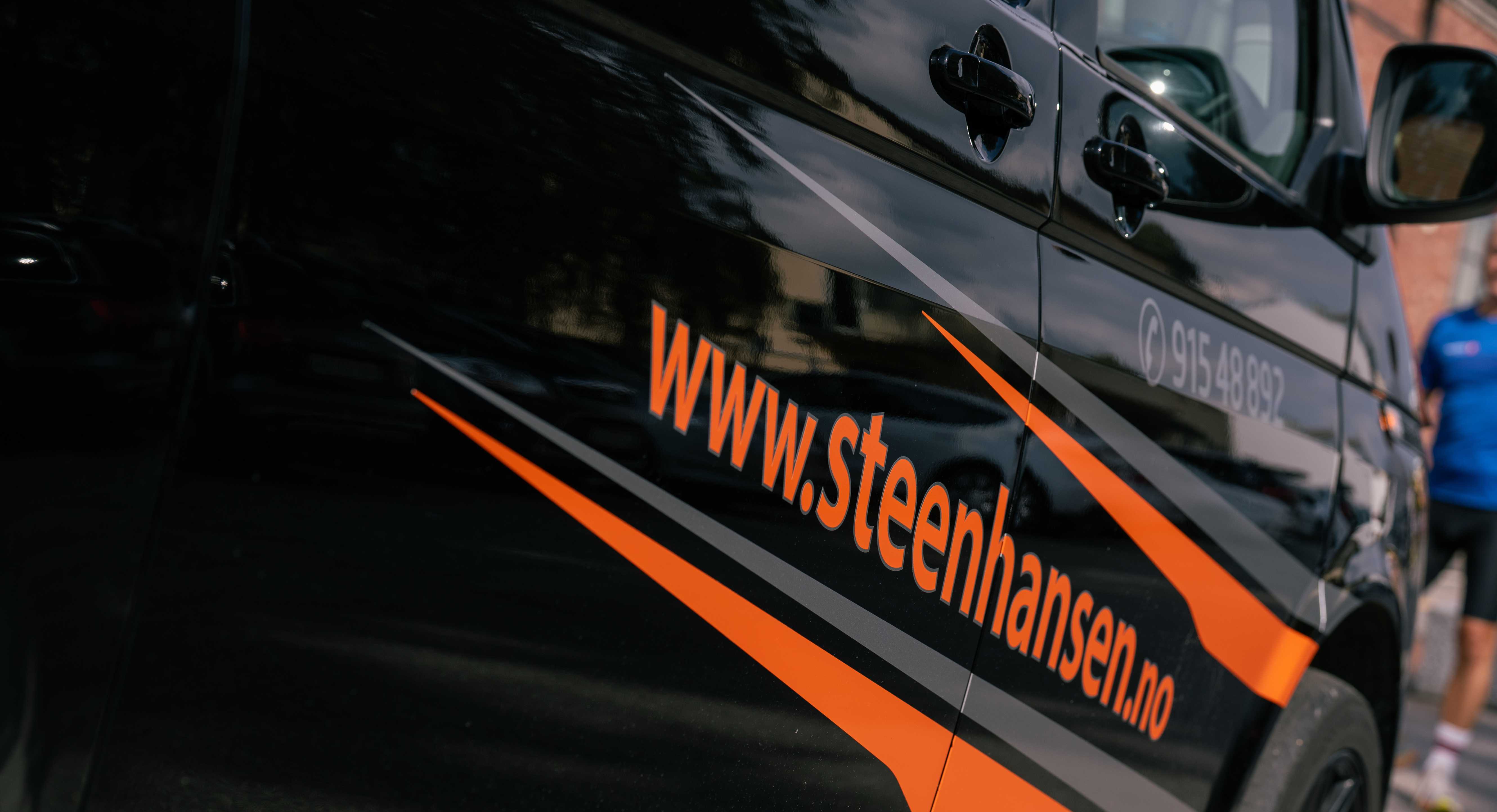 Image of a woman taking a photo.