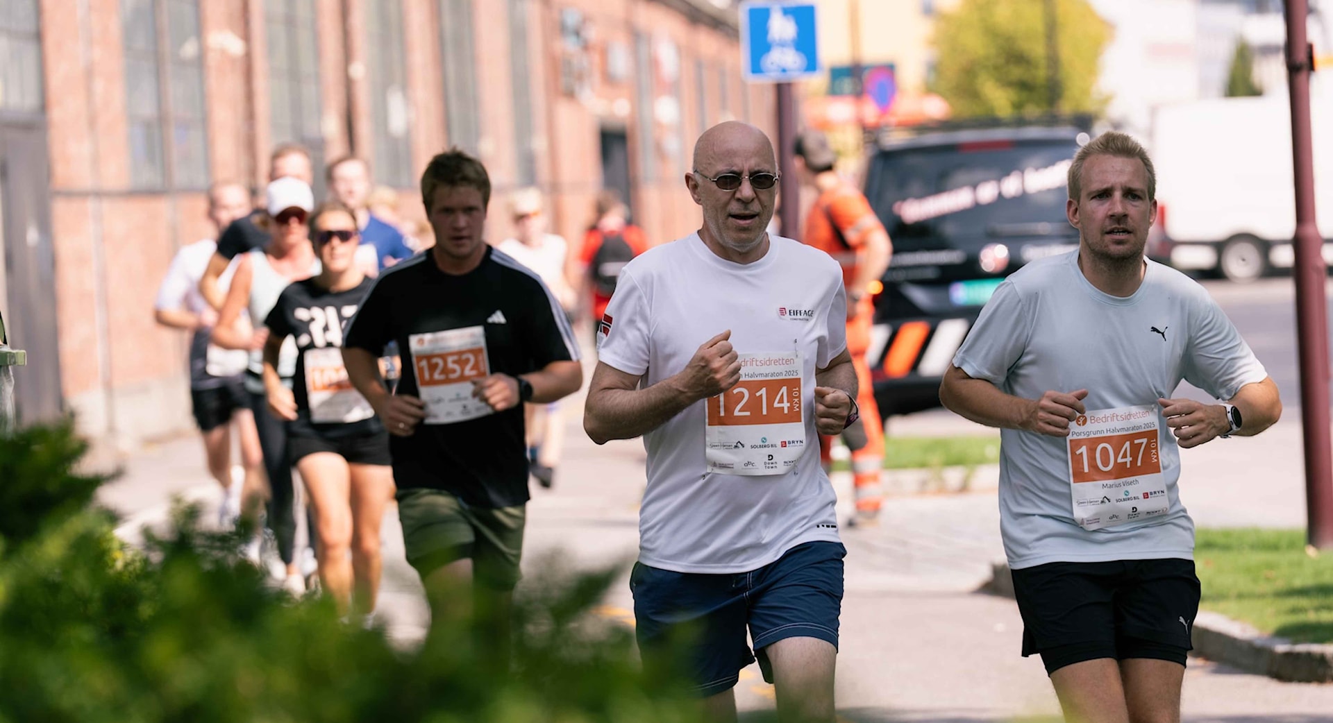 Image of a woman taking a photo.