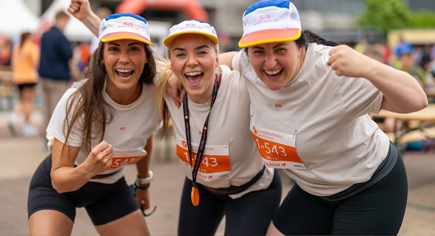 Image of a woman taking a photo.
