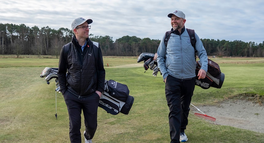 Image of a woman taking a photo.