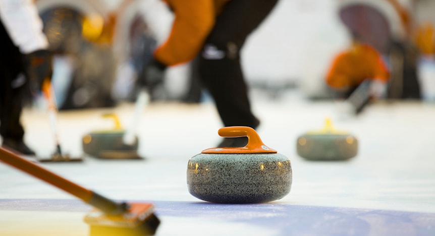 Image of a woman taking a photo.