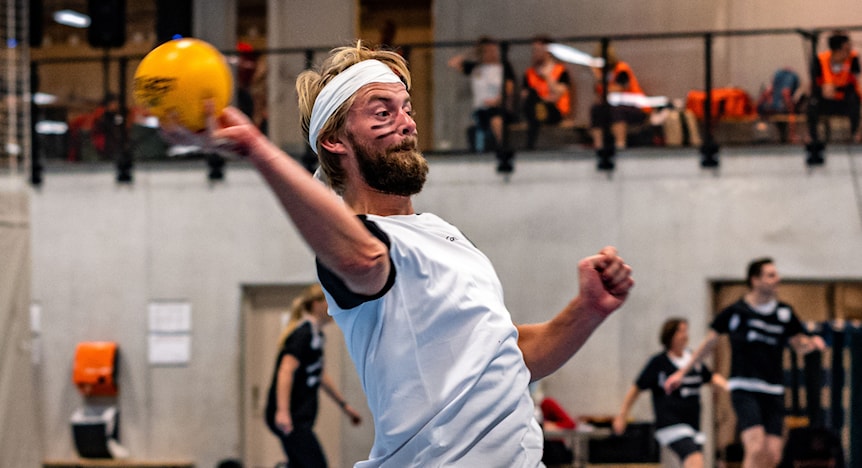 Image of a woman taking a photo.