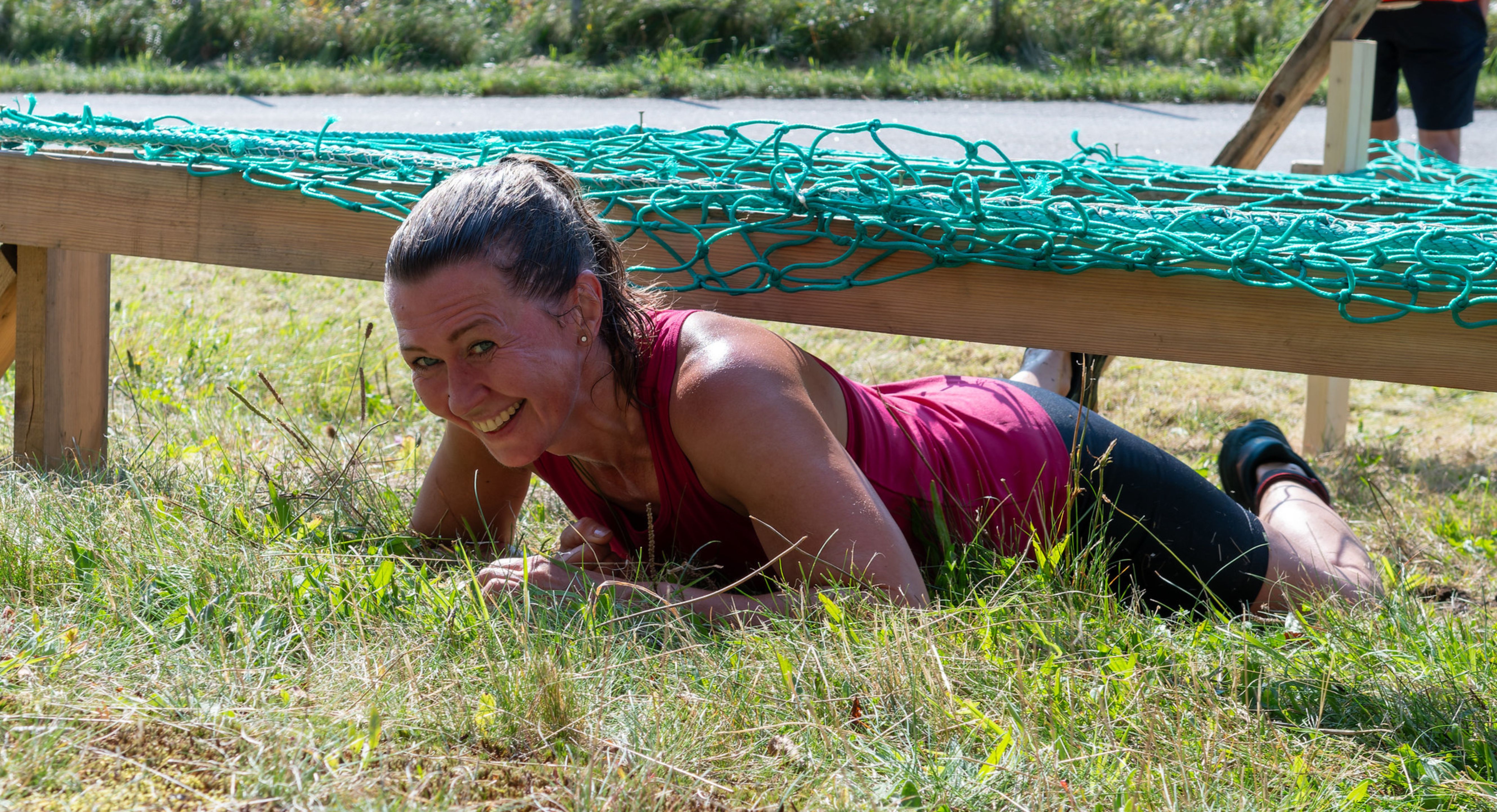 Image of a woman taking a photo.