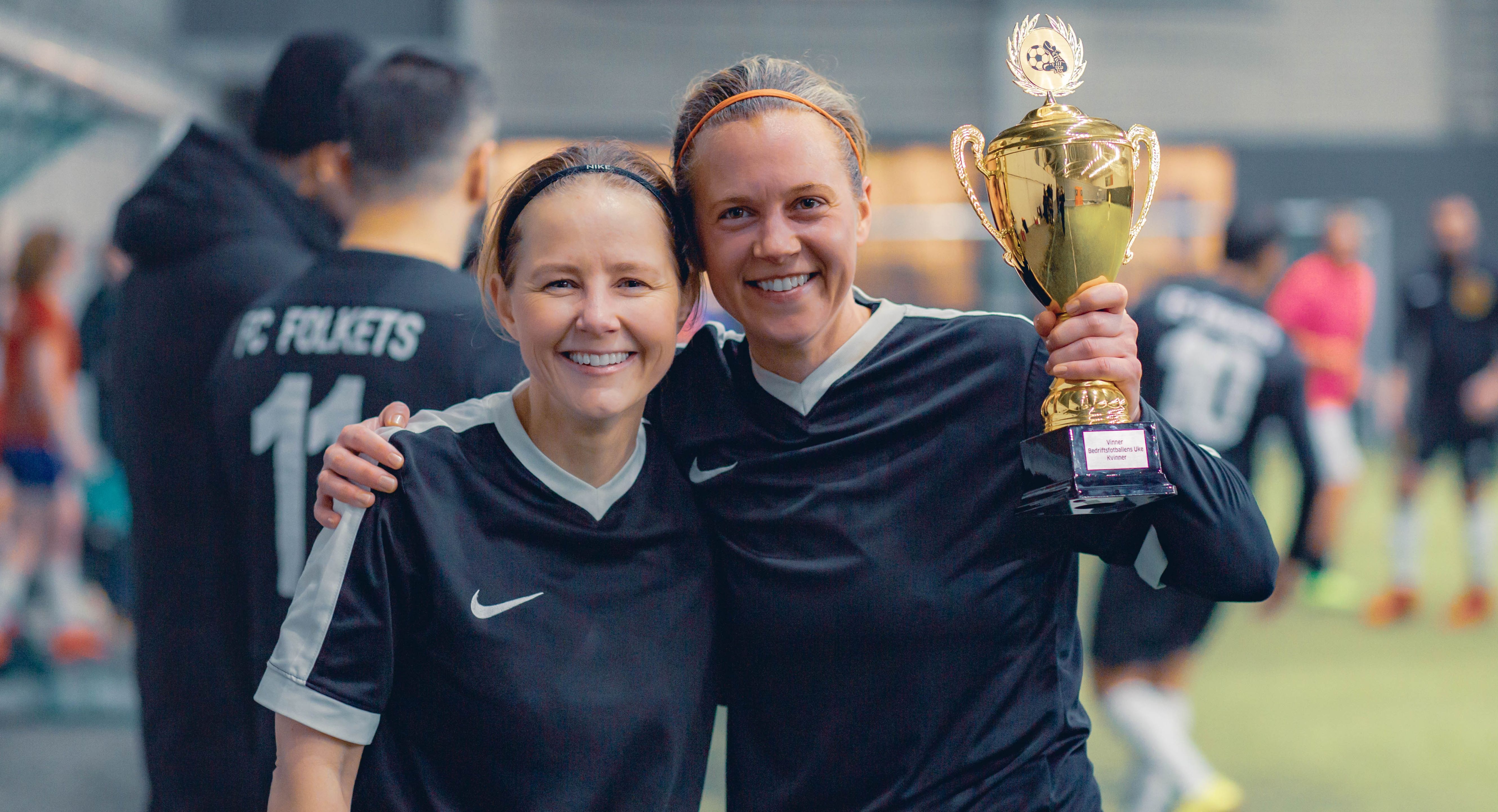 Image of a woman taking a photo.