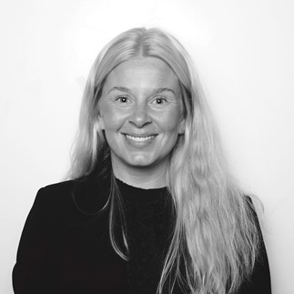 Image of a woman taking a photo.