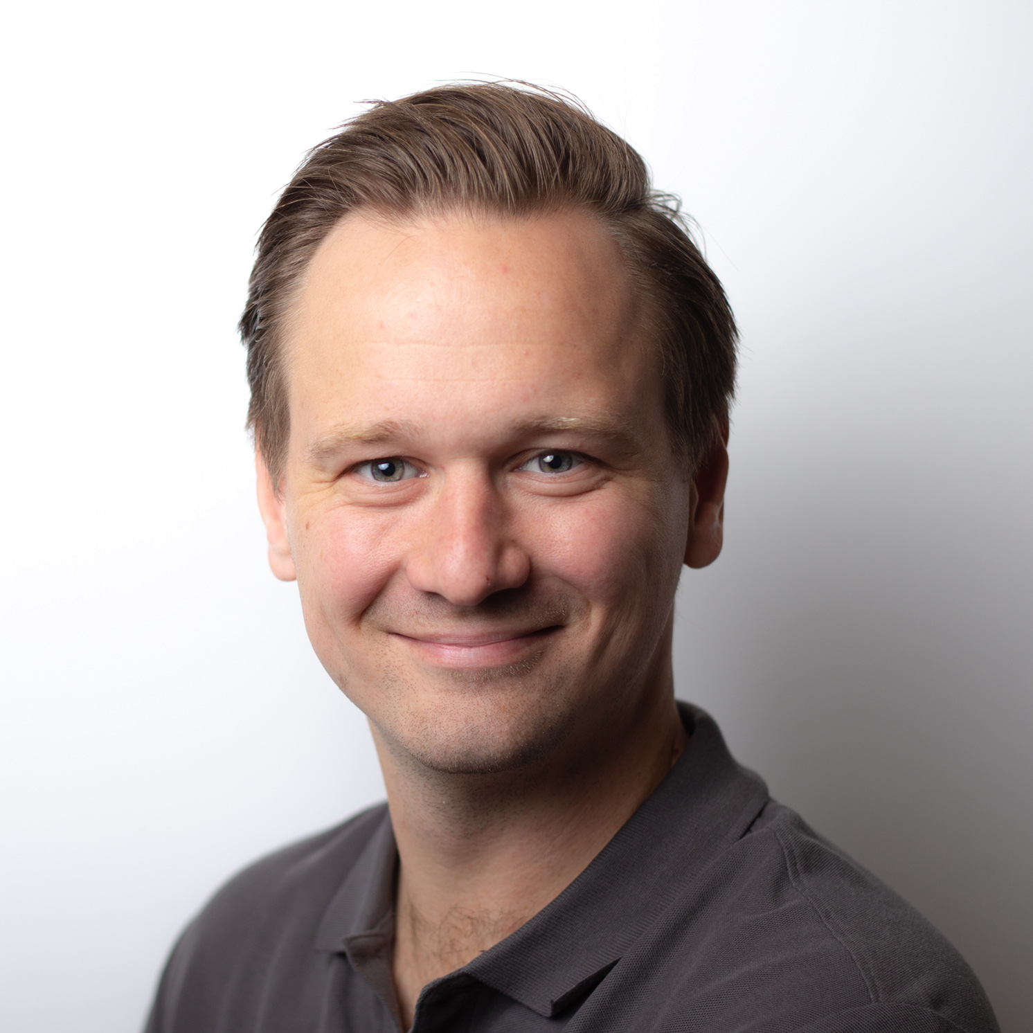 Image of a woman taking a photo.