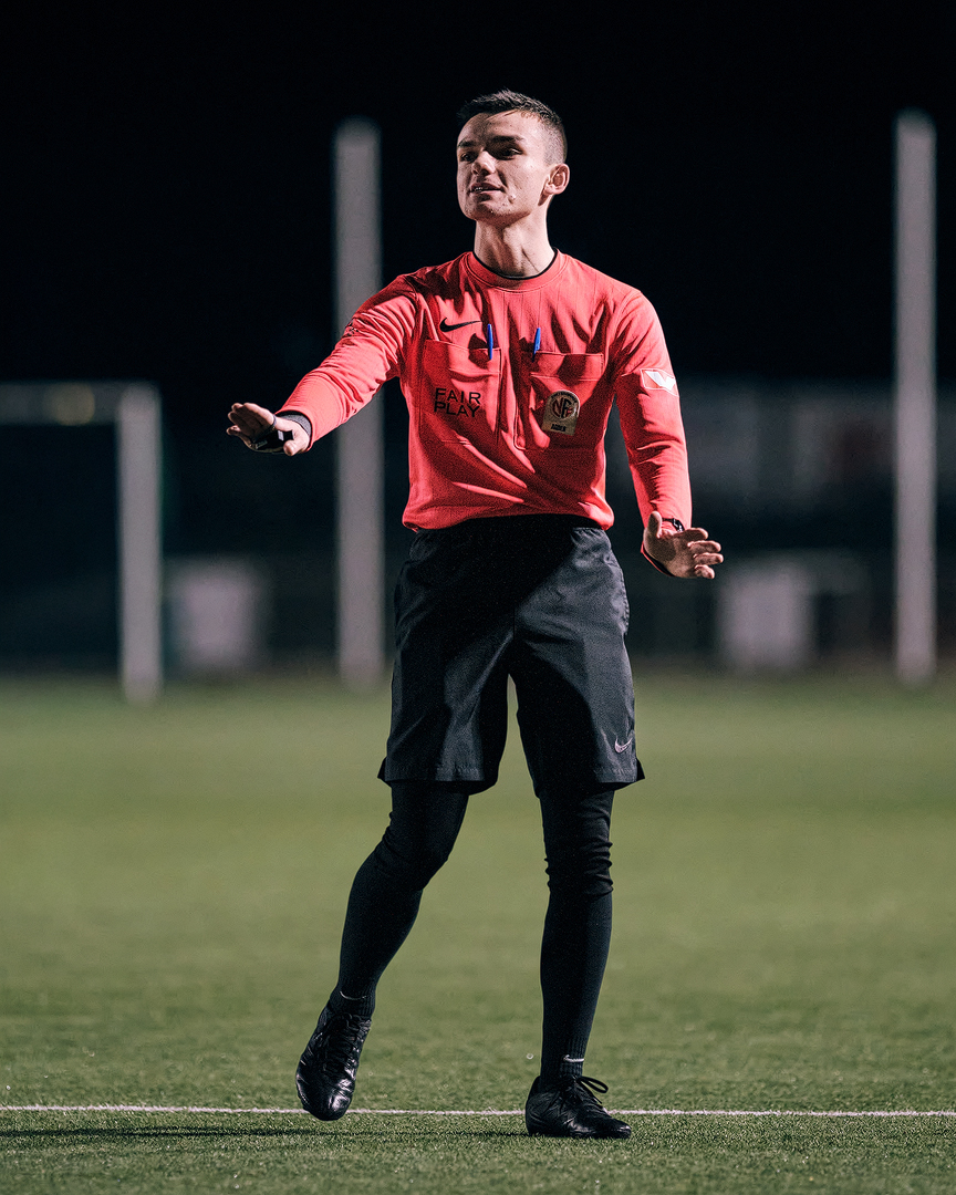 Image of a woman taking a photo.