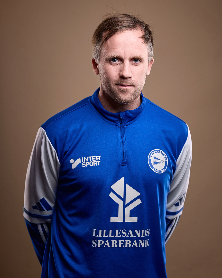 Image of a woman taking a photo.