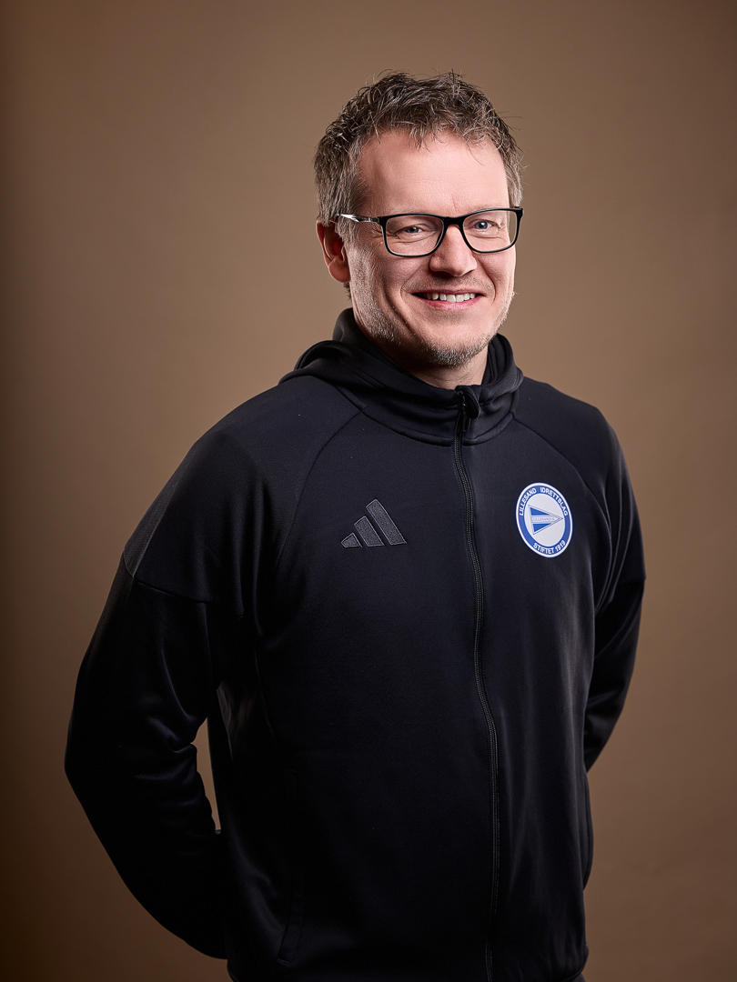 Image of a woman taking a photo.