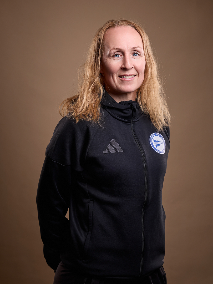 Image of a woman taking a photo.