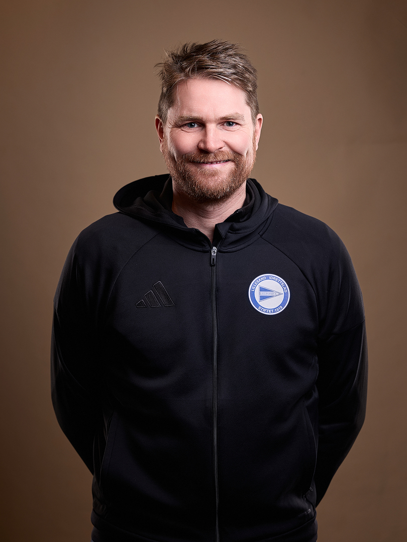 Image of a woman taking a photo.