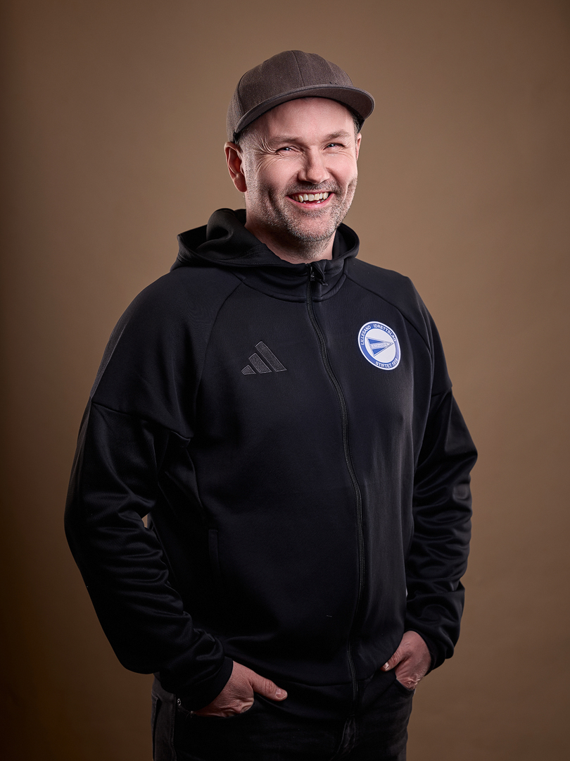 Image of a woman taking a photo.