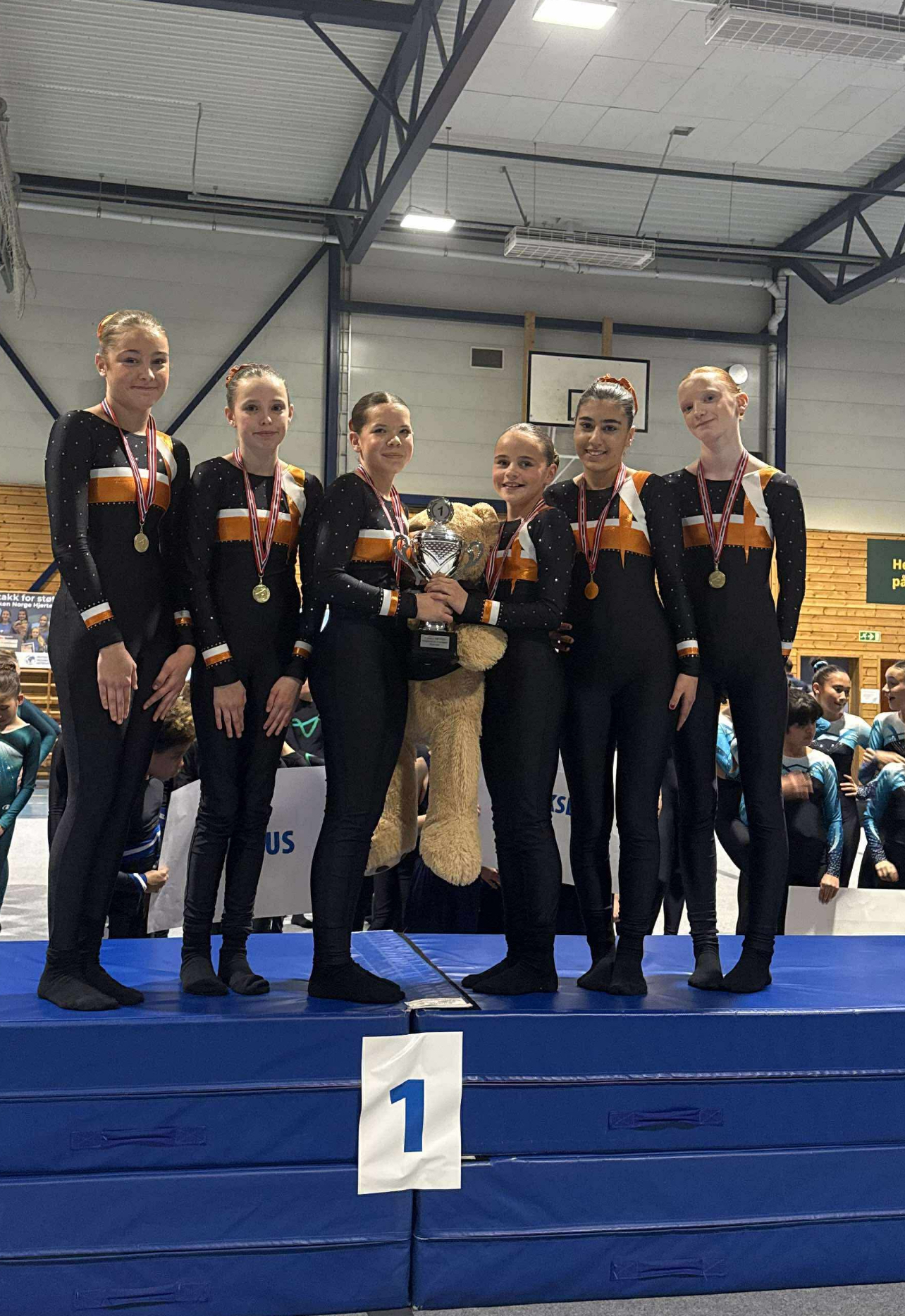 Image of a woman taking a photo.