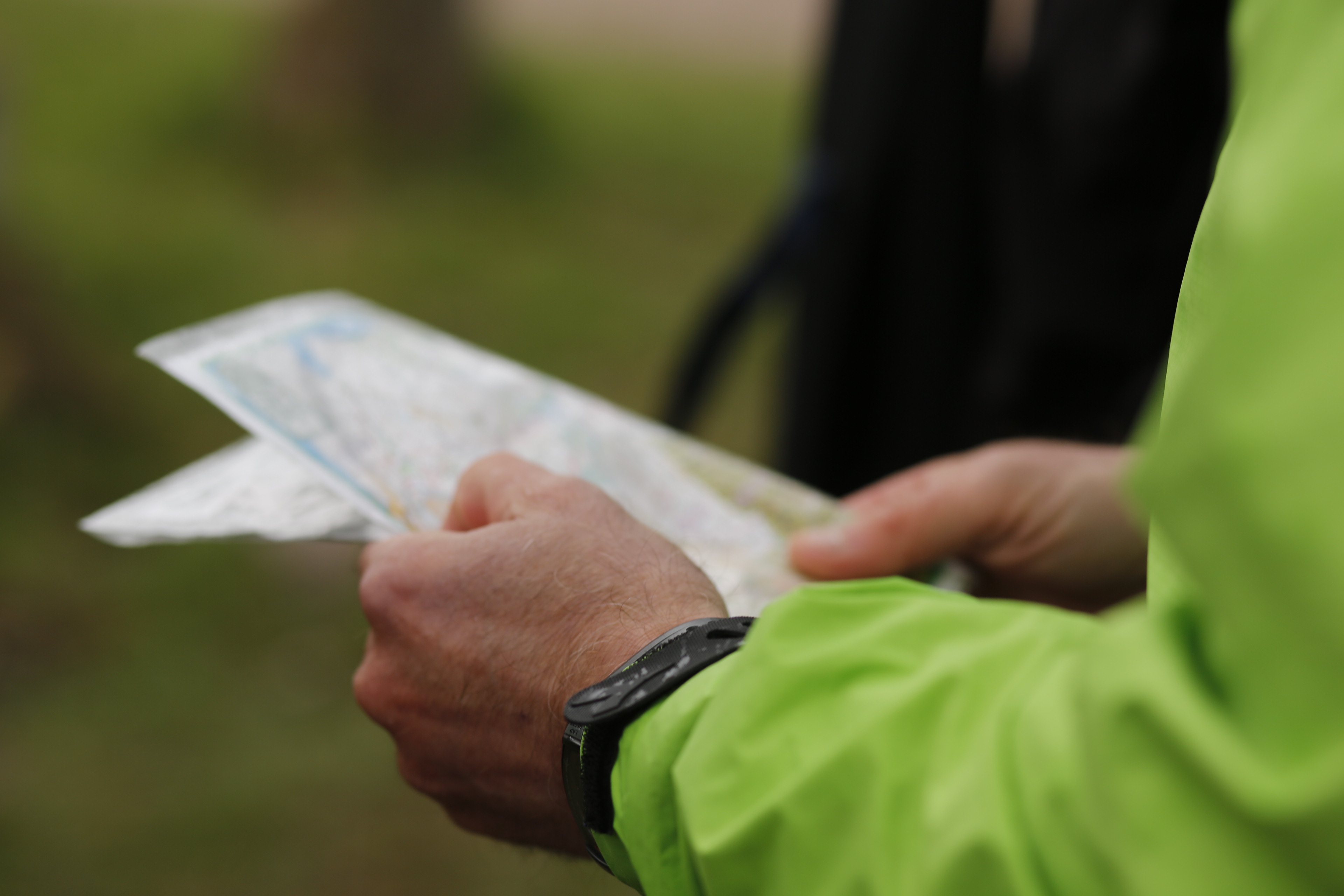 Image of a woman taking a photo.