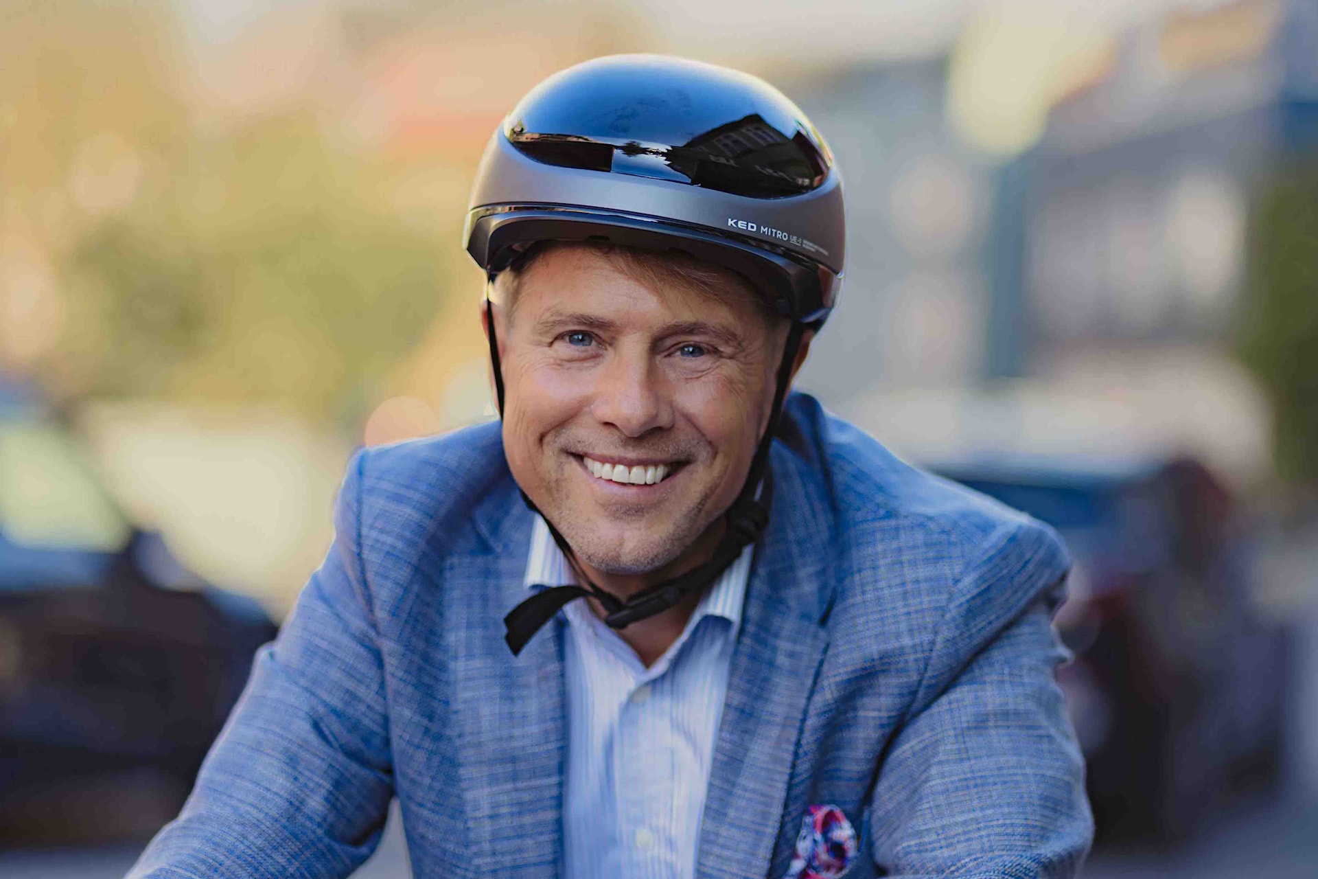 Image of a woman taking a photo.