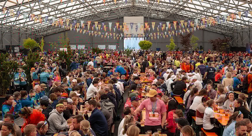 Image of a woman taking a photo.