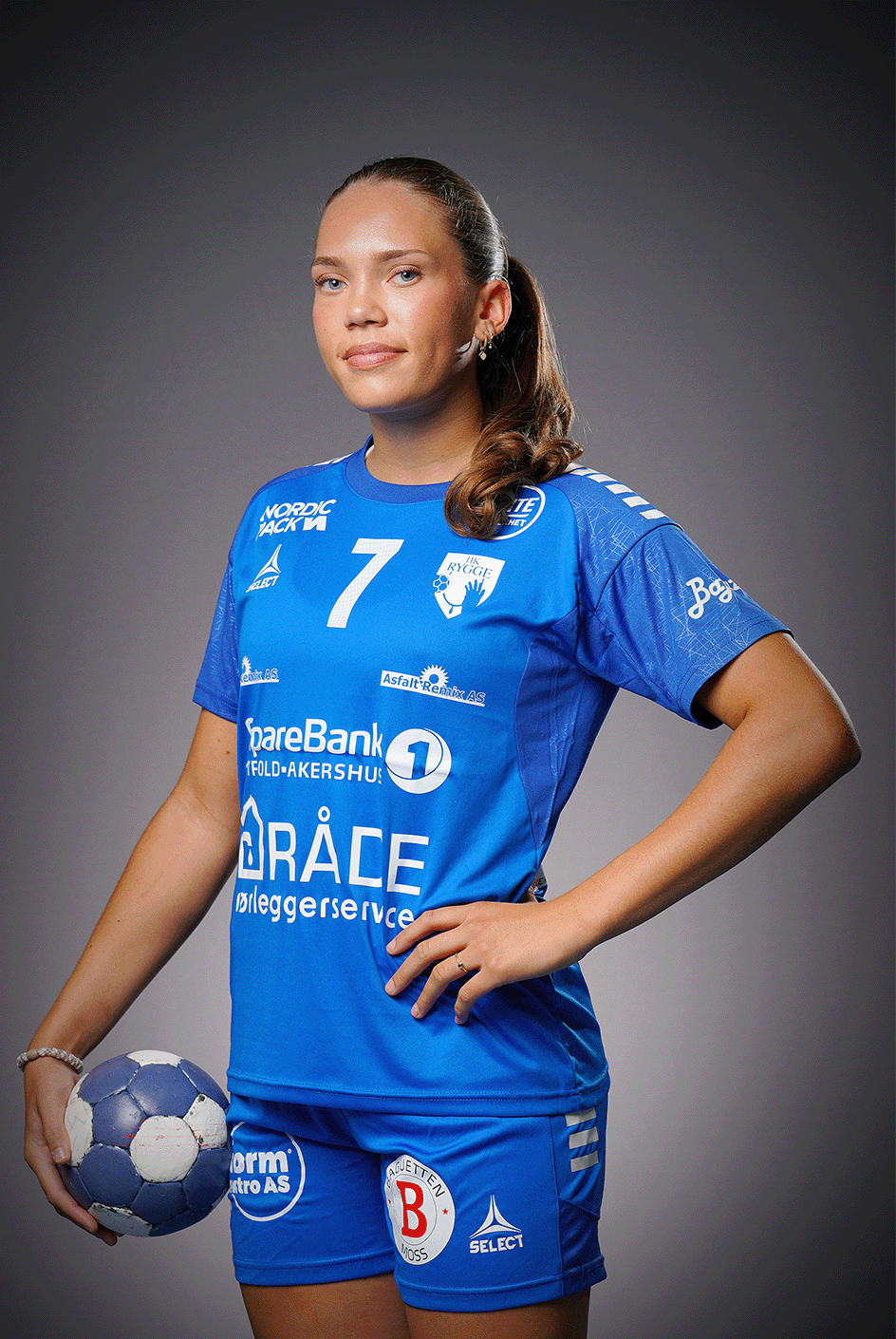 Image of a woman taking a photo.