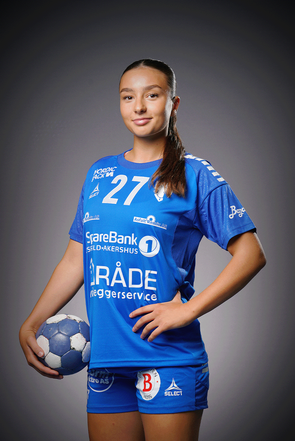 Image of a woman taking a photo.