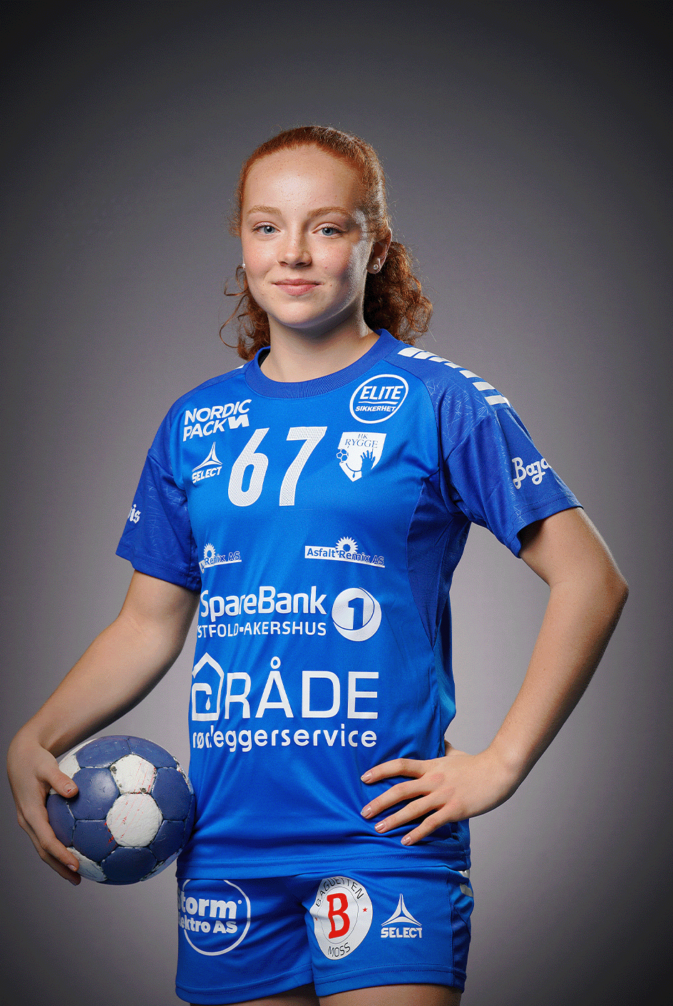 Image of a woman taking a photo.