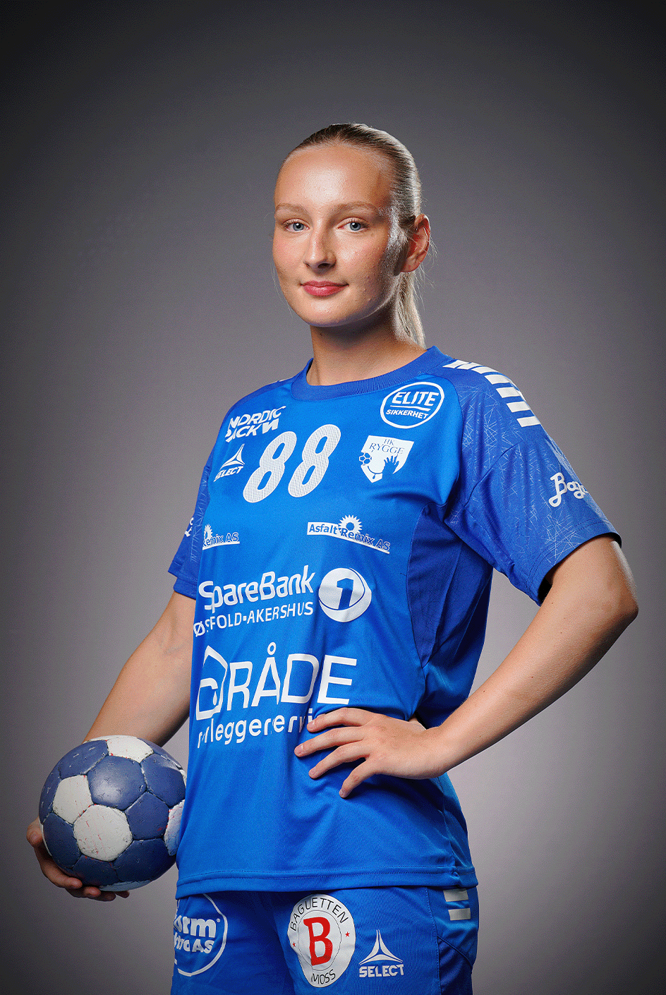 Image of a woman taking a photo.