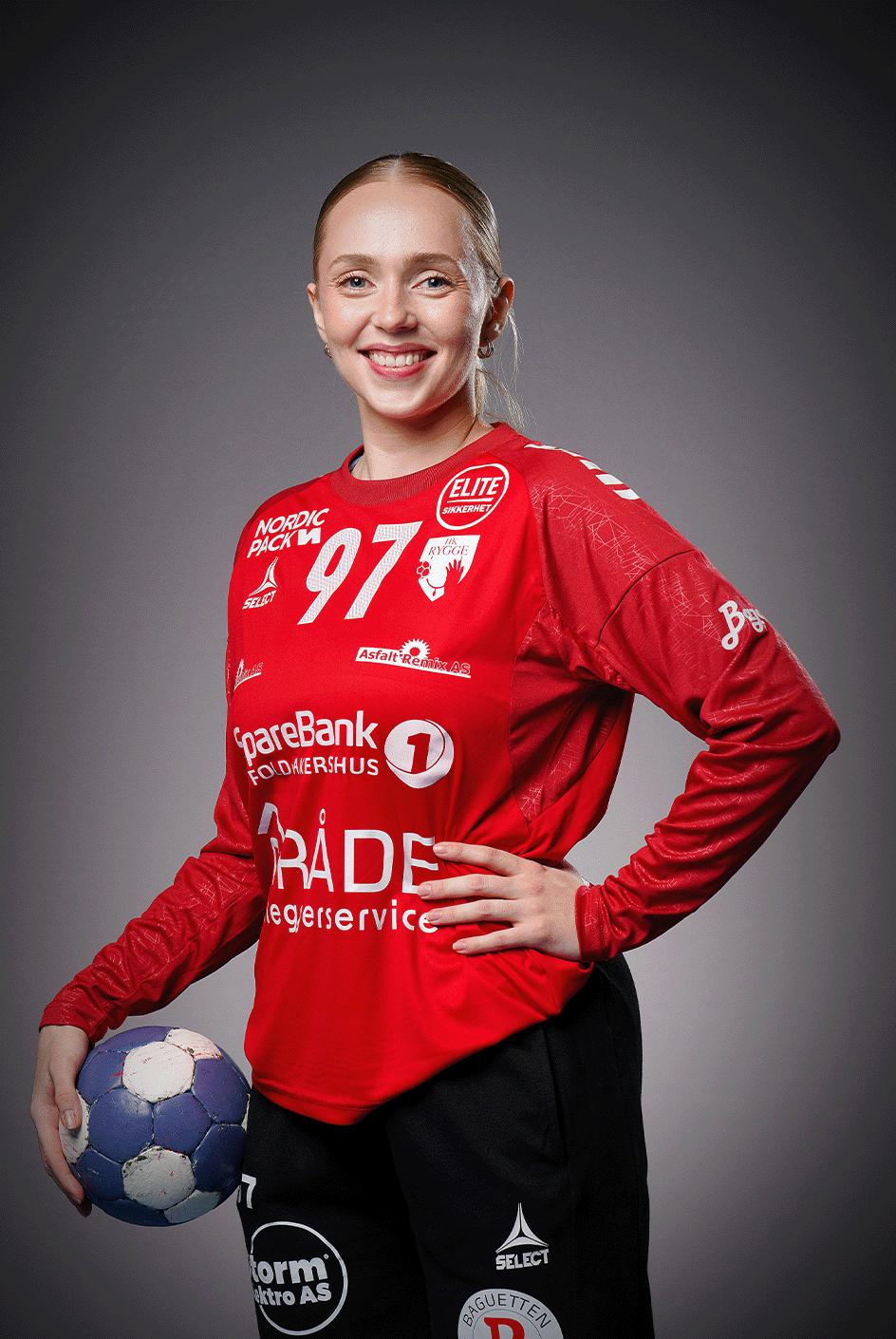 Image of a woman taking a photo.