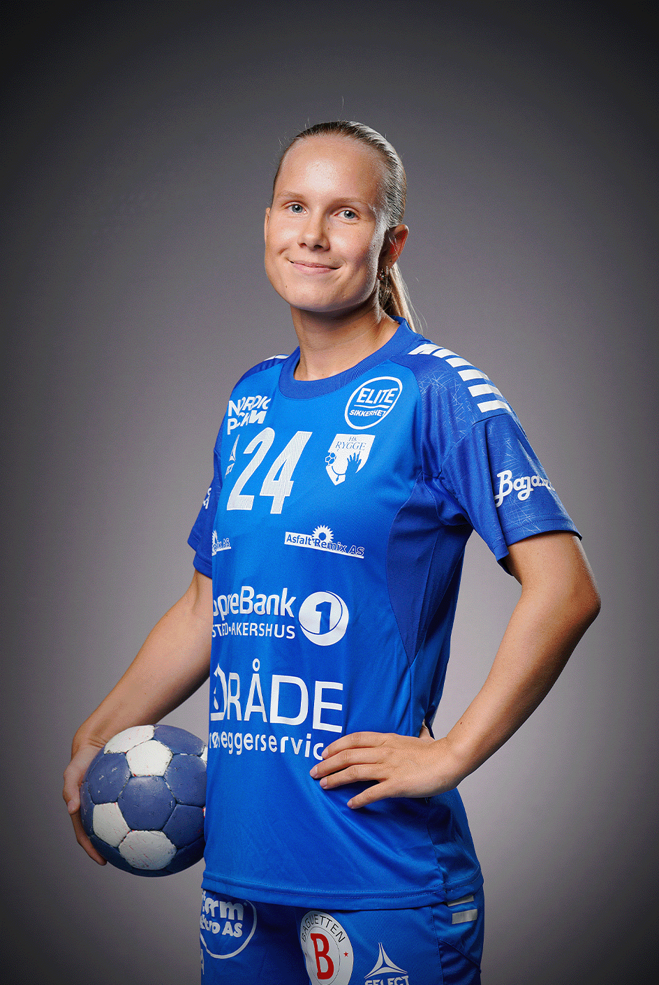 Image of a woman taking a photo.