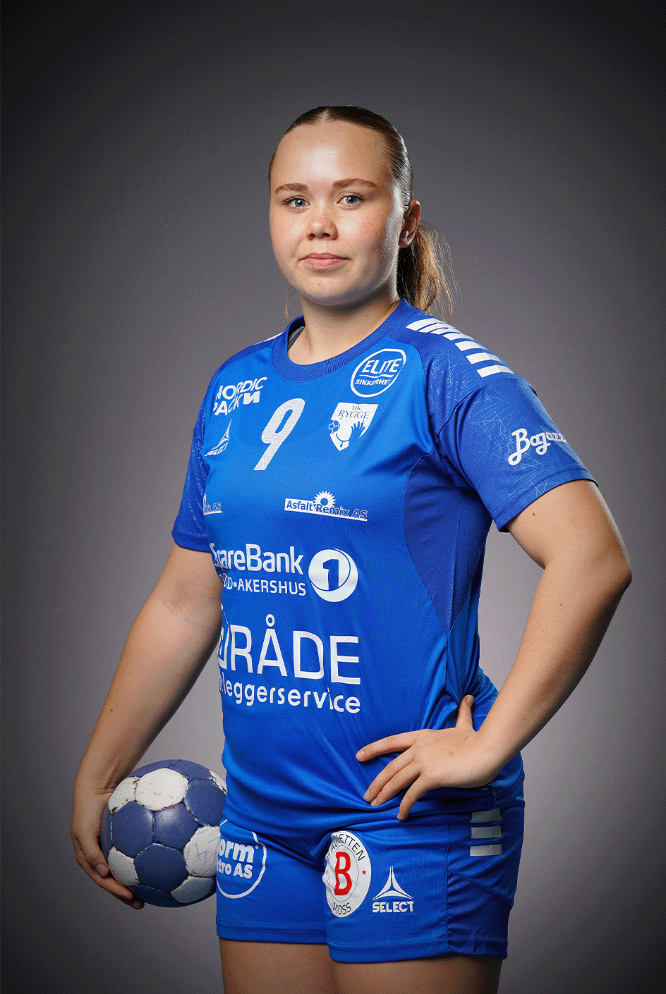 Image of a woman taking a photo.