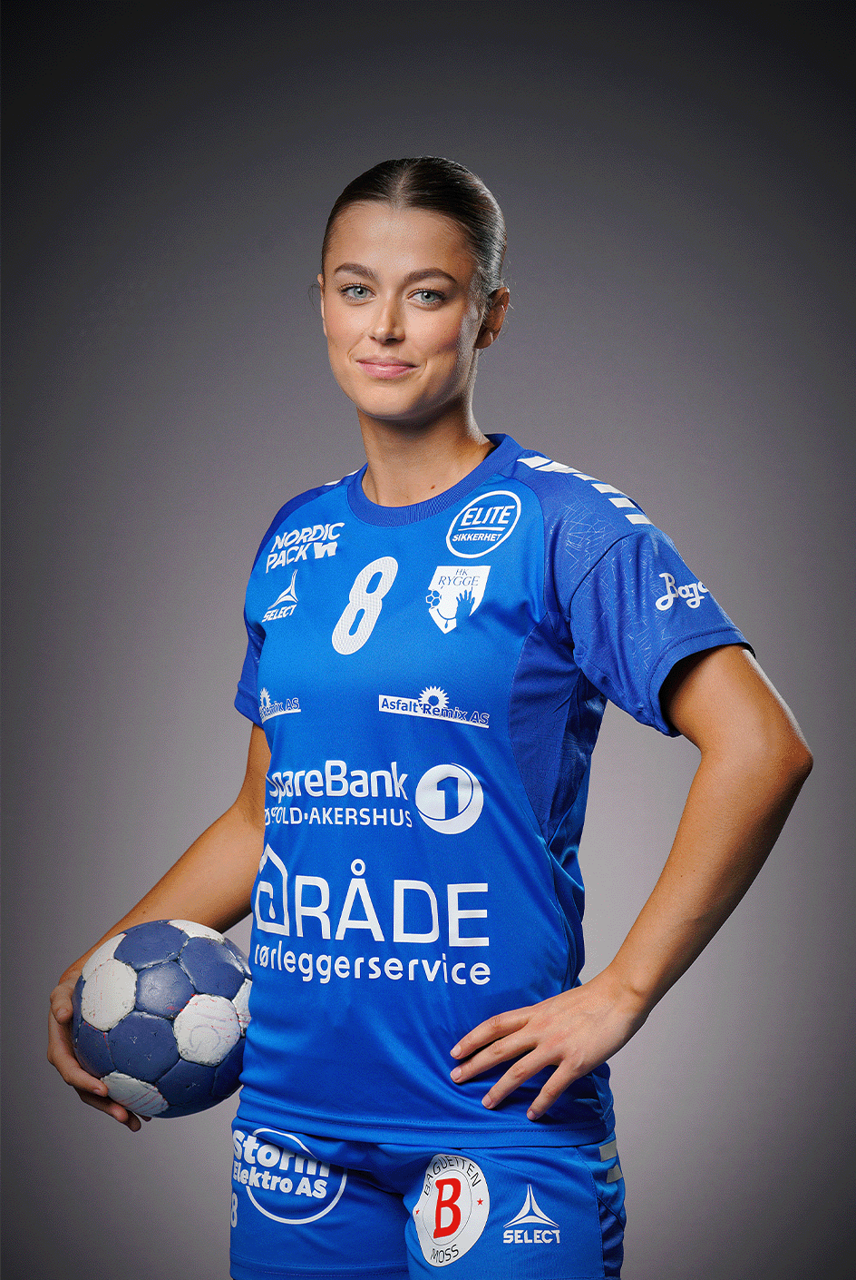 Image of a woman taking a photo.