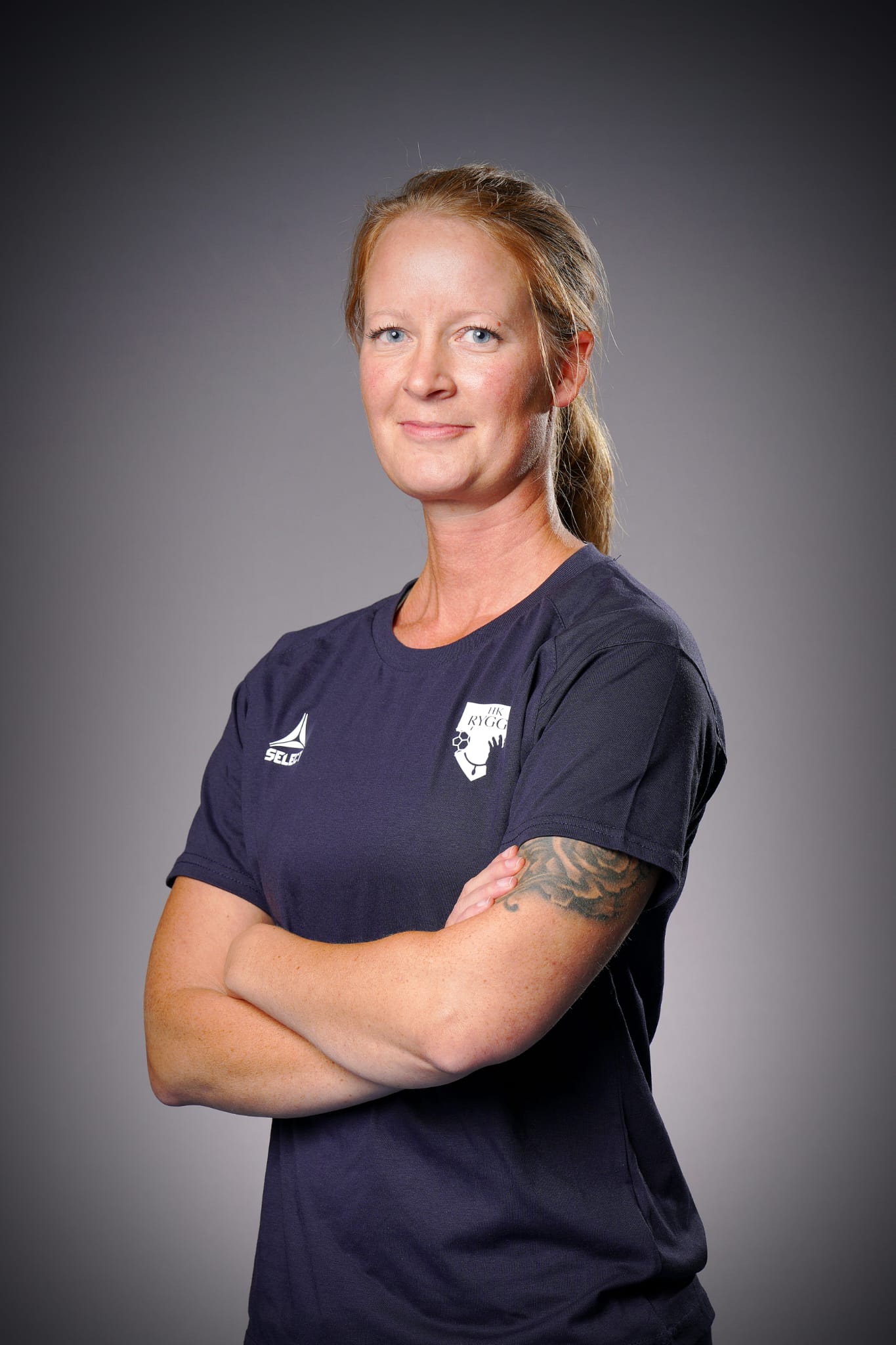 Image of a woman taking a photo.