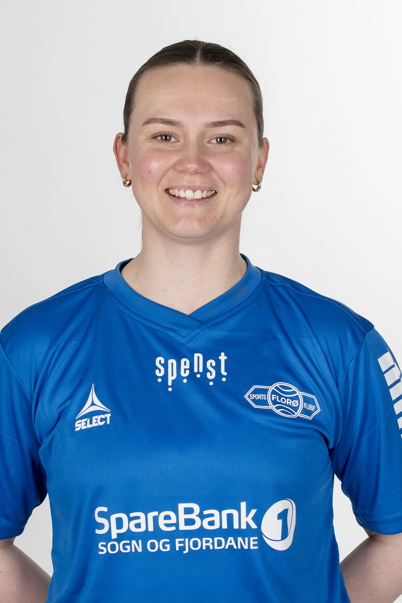 Image of a woman taking a photo.