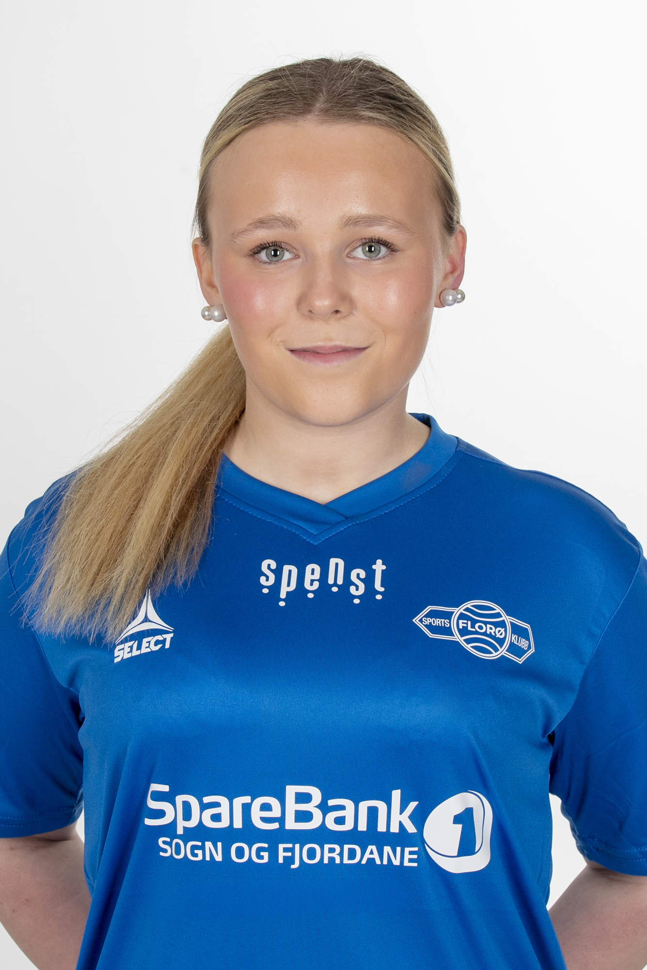 Image of a woman taking a photo.