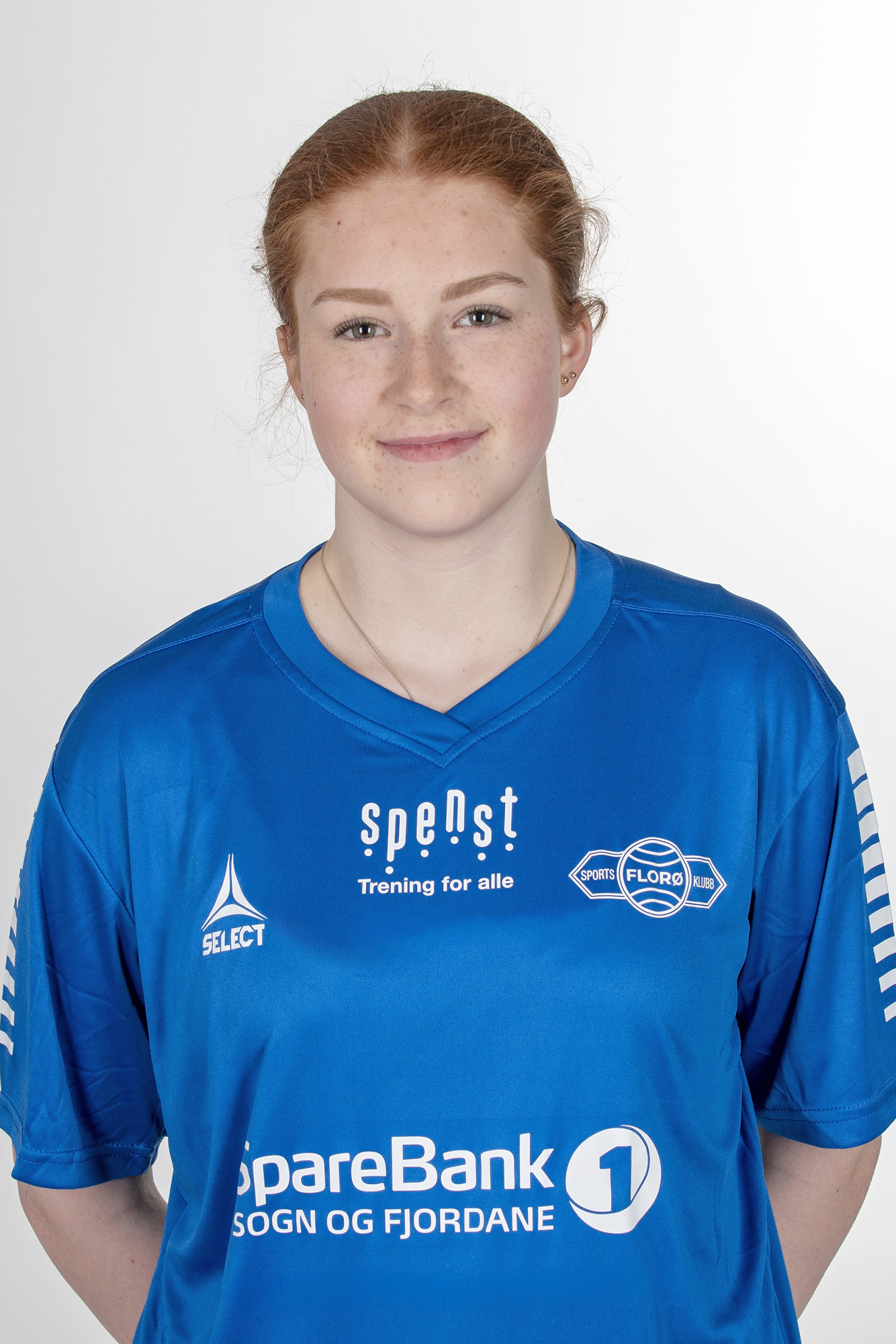 Image of a woman taking a photo.